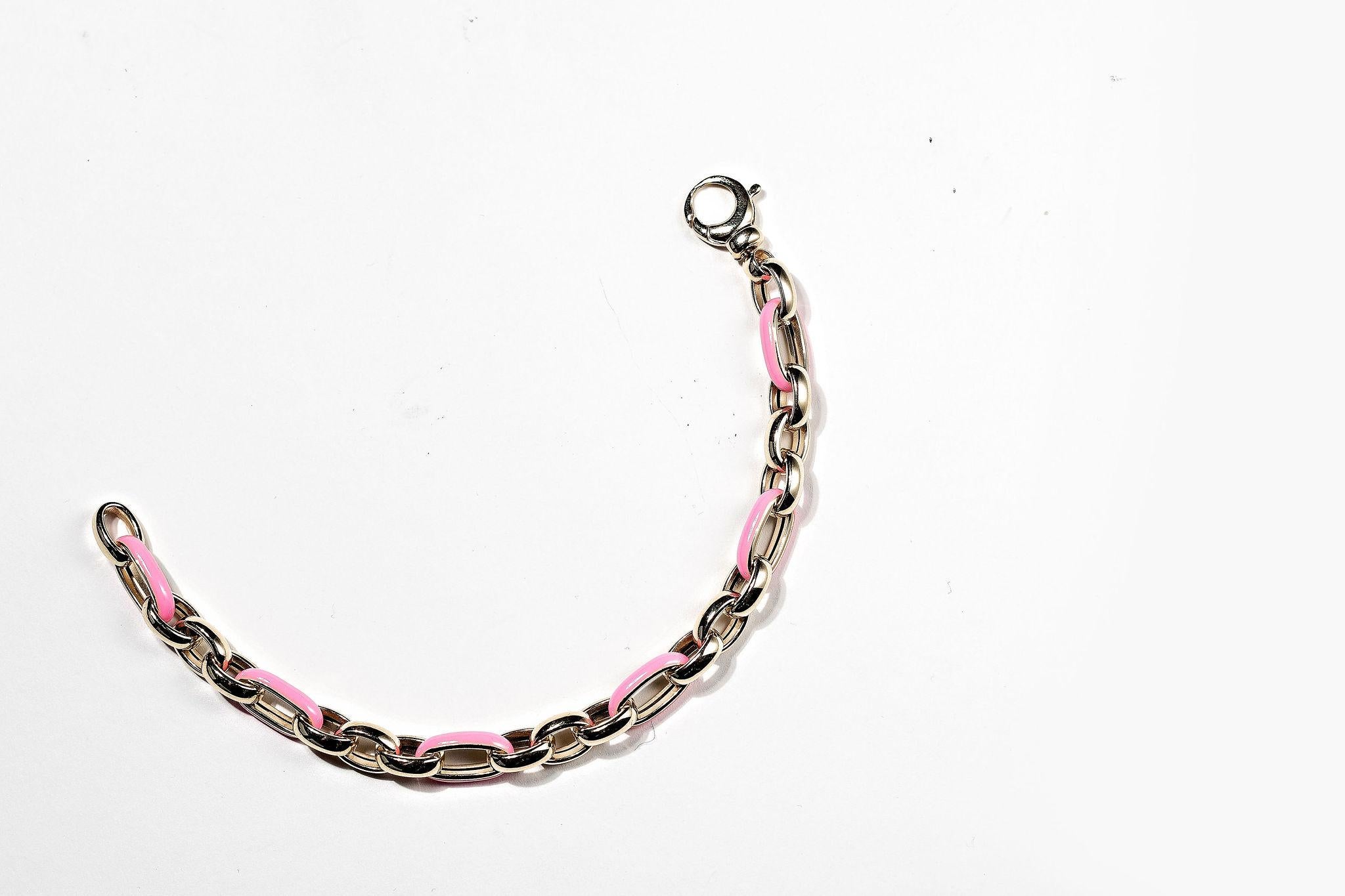 14k yellow gold Enamel Bracelet - Handmade in Italy 

Metal: 14k yellow gold & Pink  enamel

Size of links: Large link 8mm & small link 4mm

Size: 7.50 inches 

Why pay designer prices when we all get ours from the same manufacturer in Italy? 

This