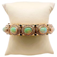 Bracelet jonc en or jaune 14 carats fait main avec opale d'Éthiopie, tsavorite et diamants