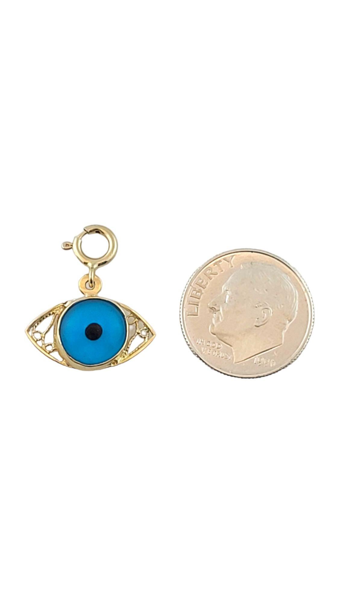 Ward off evil spirits with this beautiful evil eye charm!

Size: 17.5 mm X 13.2 mm

Weight: 1.3 g/ 0.8 dwt

Hallmark: AR 14K

Very good condition, professionally polished.

Will come packaged in a gift box or pouch (when possible) and will be