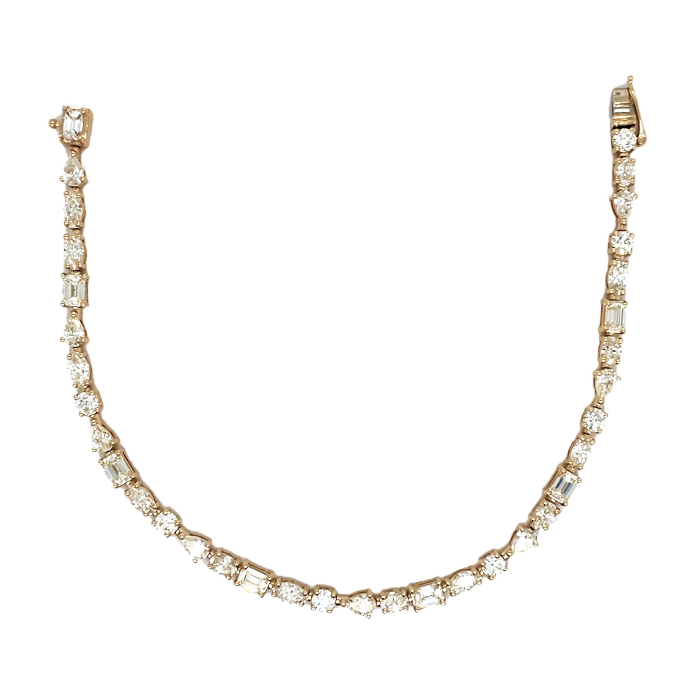 Quality Bracelet: Crafted of 14k yellow gold this bracelet features 35 Natural Fancy Shape Diamonds, Fancy Shape Diamonds weighing 5.68 carats. Hinged Clasp Closure. 7 Inches in length.
 Surprise Your Loved Ones with Our Fancy Shape Diamond Bracelet