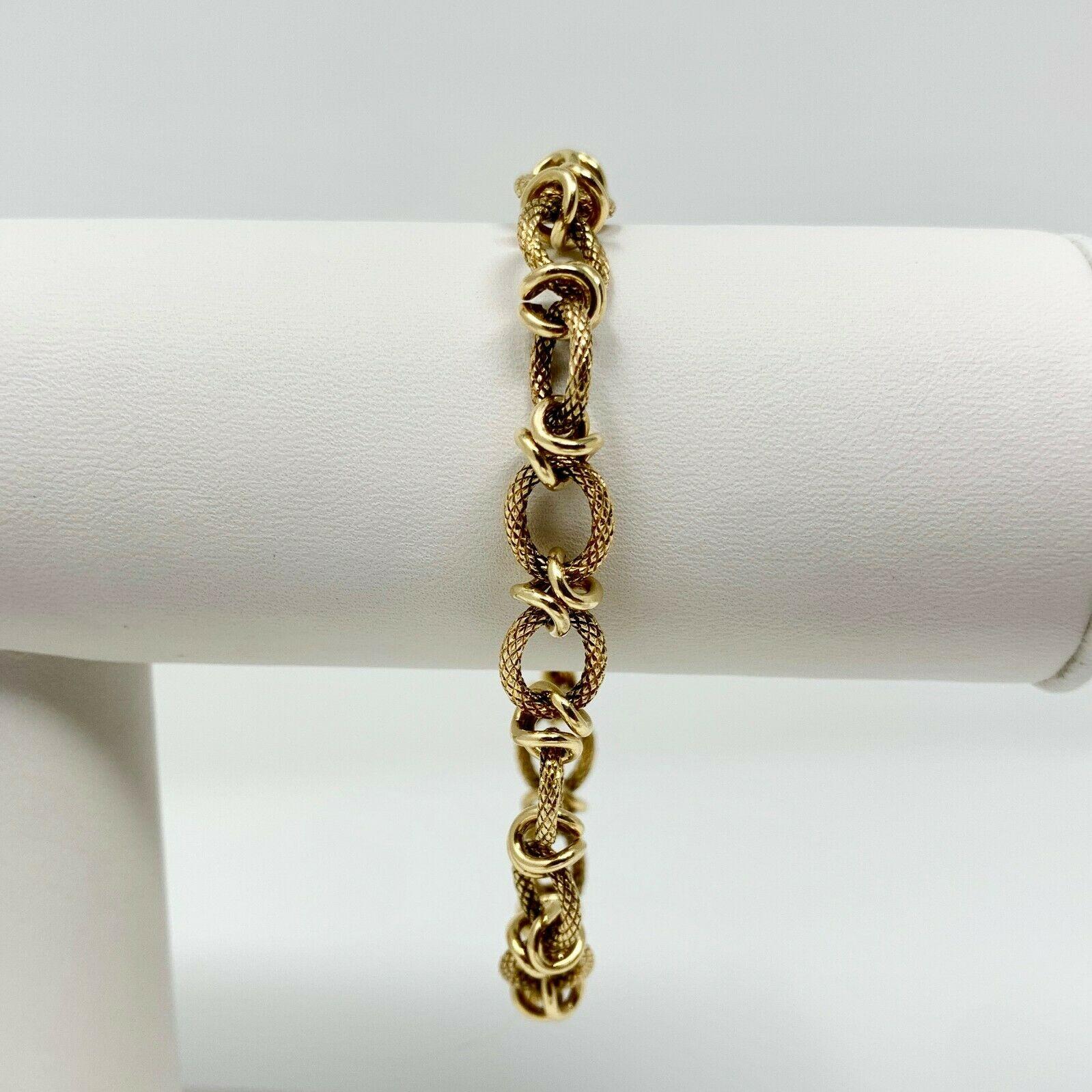 14k Yellow Gold Vintage Fancy Textured Cable Link Chain Bracelet 7.5 Inches

Condition:  Excellent Condition, Professionally Cleaned and Polished
Metal:  14k Gold (Marked, and Professionally Tested)
Weight:  19.7g
Length:  7.5 Inches
Width: 