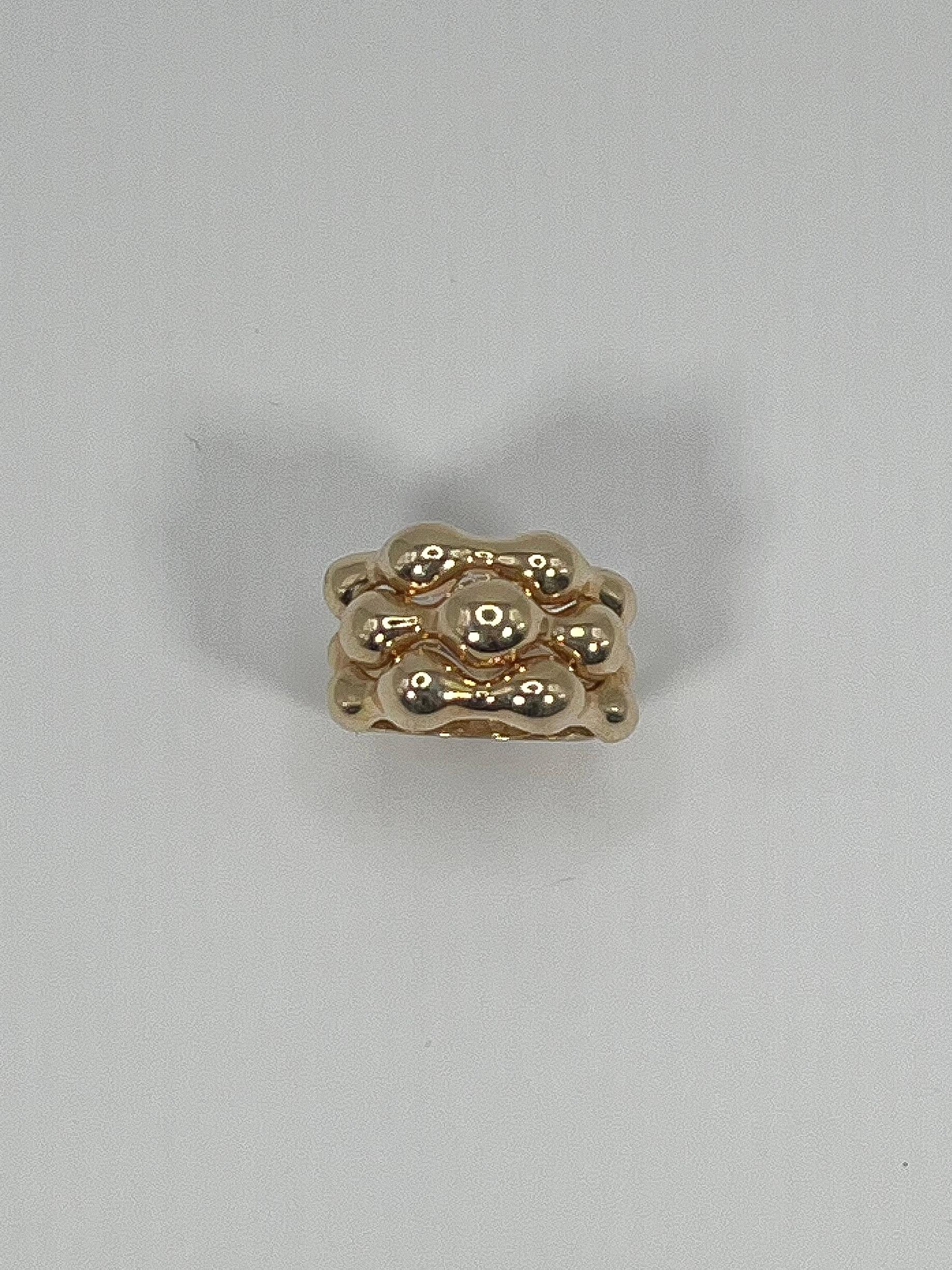 14K Yellow Gold Fashion Ring, the size of this ring is 6 1/4. The total weight is 7.7 Grams dimensions of the top of ring is 22MM wide by 15mm.