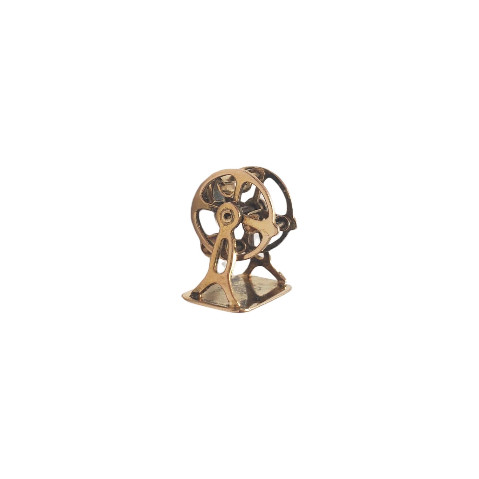 14K Yellow Gold Ferris Wheel Charm

This lovely charm features an articulating ferris wheel with hanging seats in 14K yellow gold.

Size: 12.55 mm X 8.81 mm

Weight: 1.4 gr/ 0.9 dwt

Hallmark: 14K

Very good condition, professionally polished.

Will