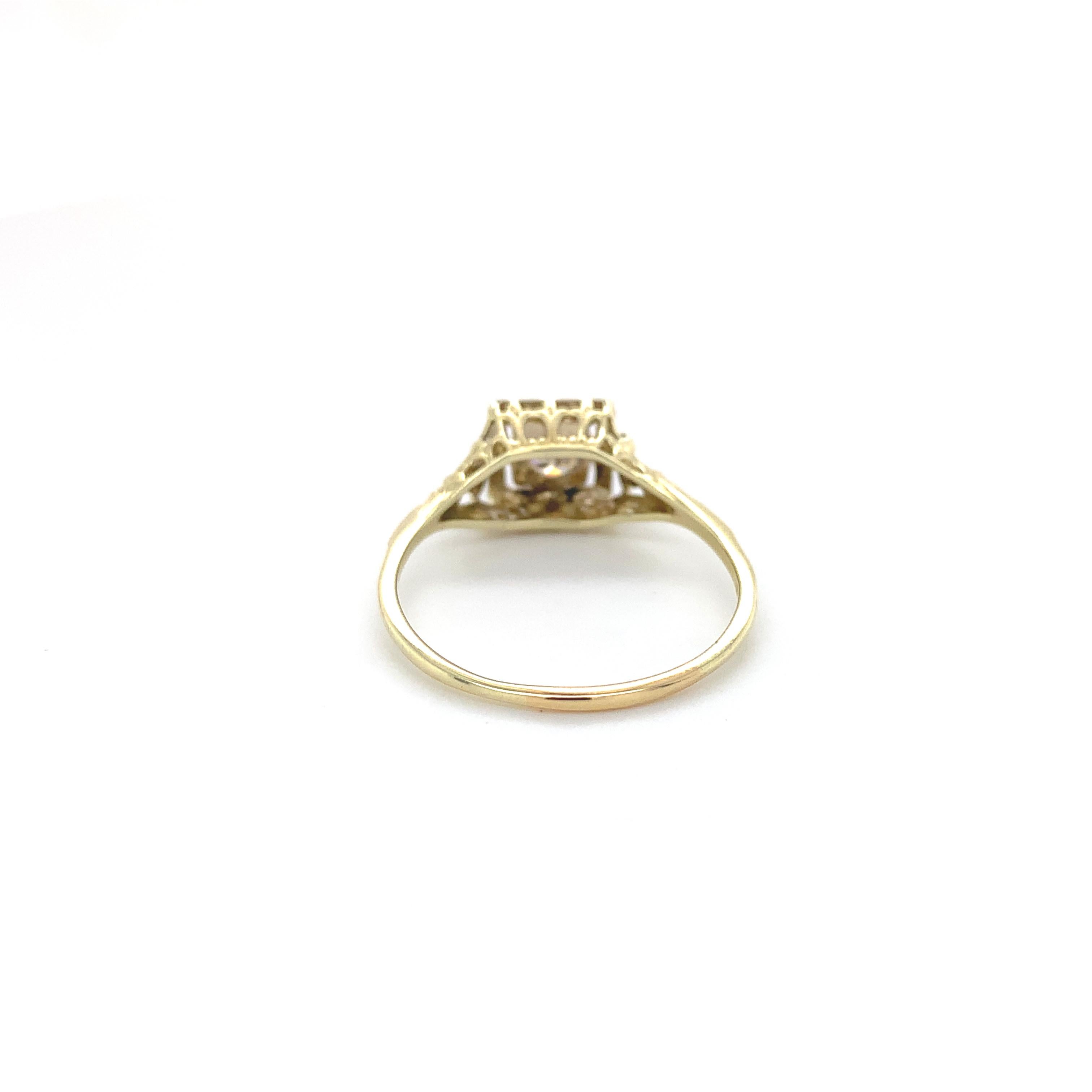 Women's 14K yellow gold filigree ring with a white gold top featuring a round brilliant For Sale