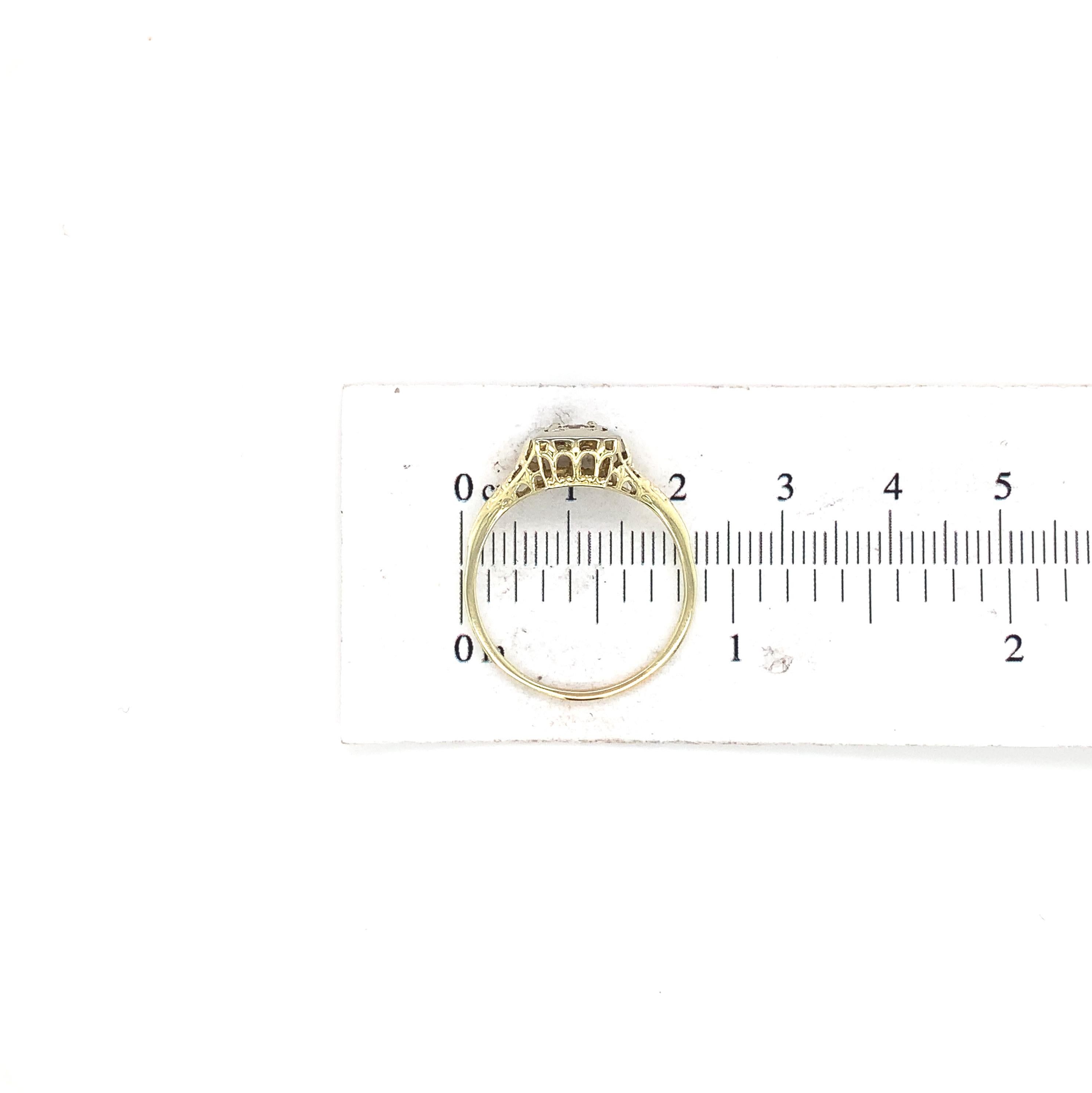 14K yellow gold filigree ring with a white gold top featuring a round brilliant For Sale 4