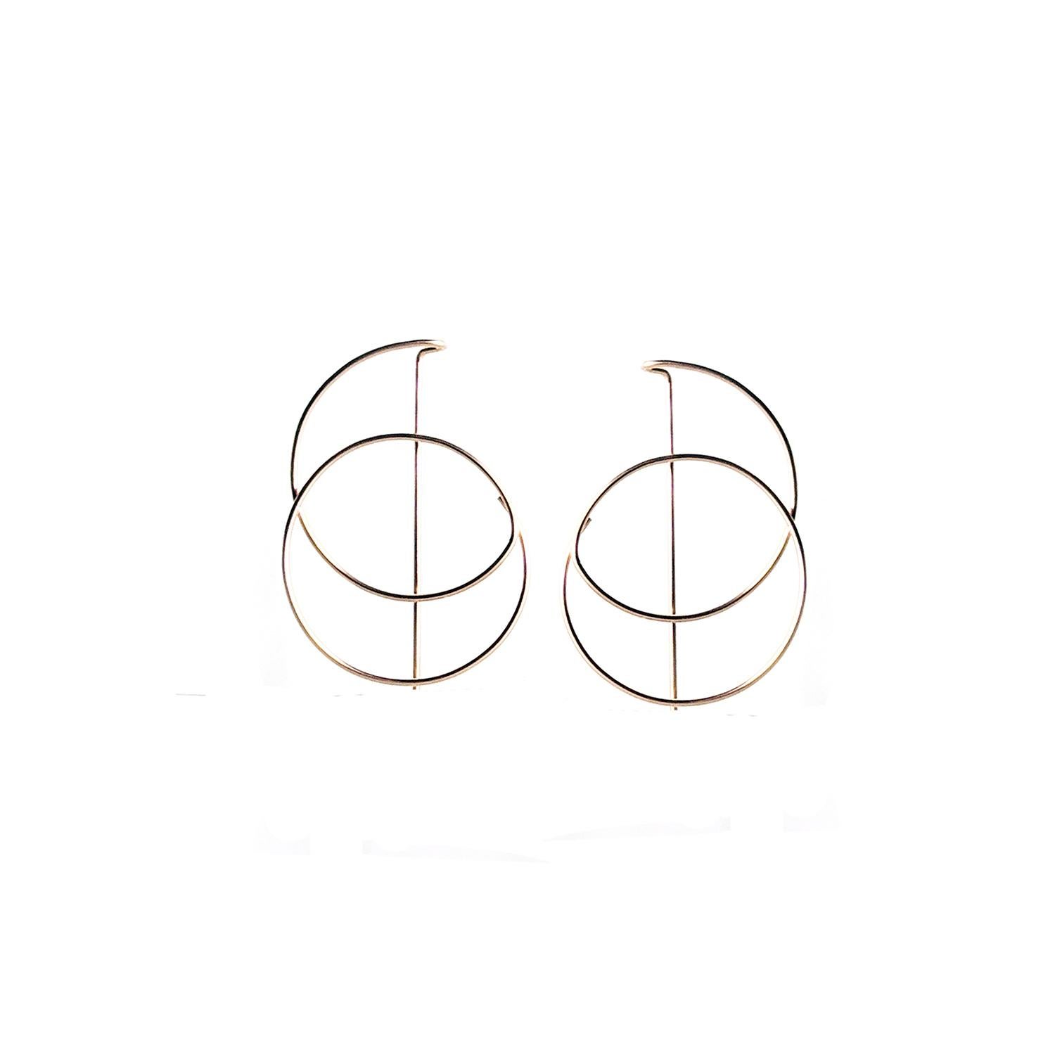 14K Yellow Gold Fill Aurora Hoops by Cindy Liebel Jewelry

Stand out with these lustrous spiral pull-through hoop earrings. Your go-to round hoops present an airy design offering simplicity with bold features adding flair to any look. The seamless