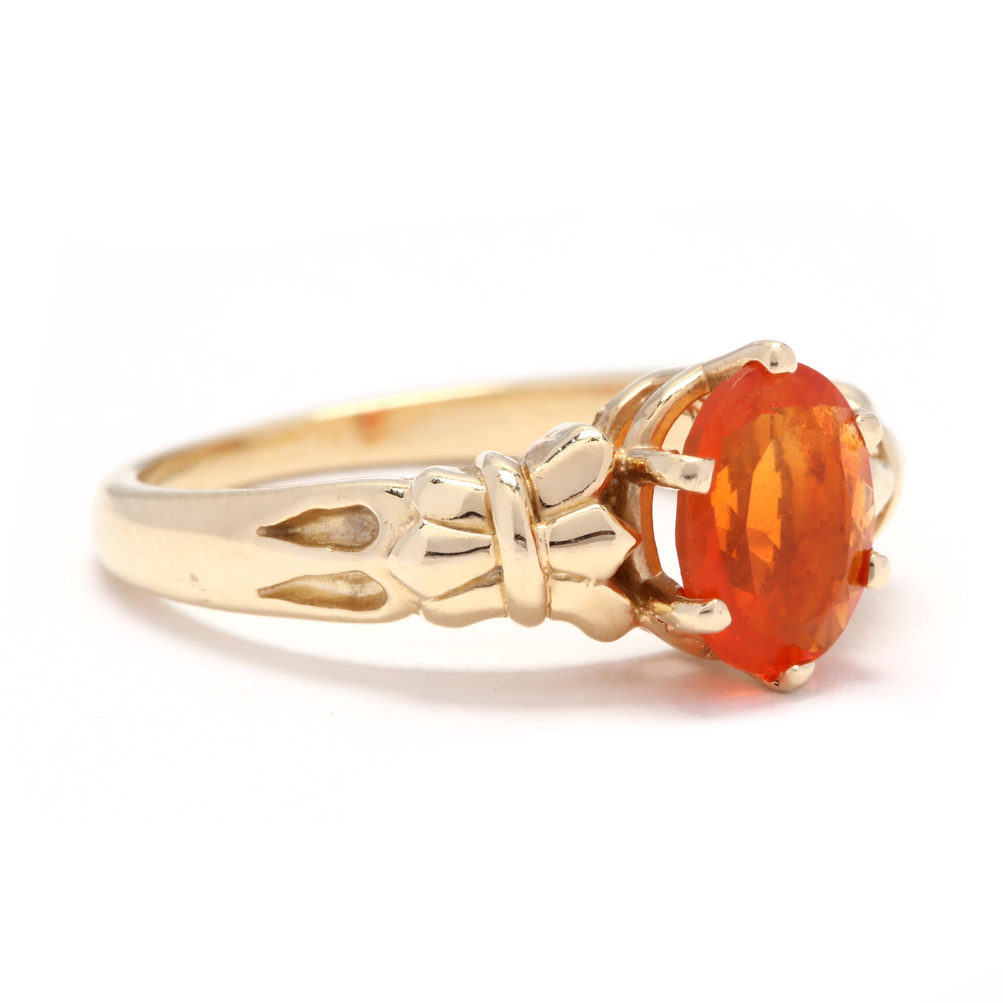 A 14 karat yellow gold and fire opal solitaire ring. This ring features a prong set, faceted oval fire opal center stone weighing approximately .80 carat with a pinched foliate design shank.

Stone:
- fire opal
- oval cut, 1 stone
- 8 x 6.17 x 3.97
