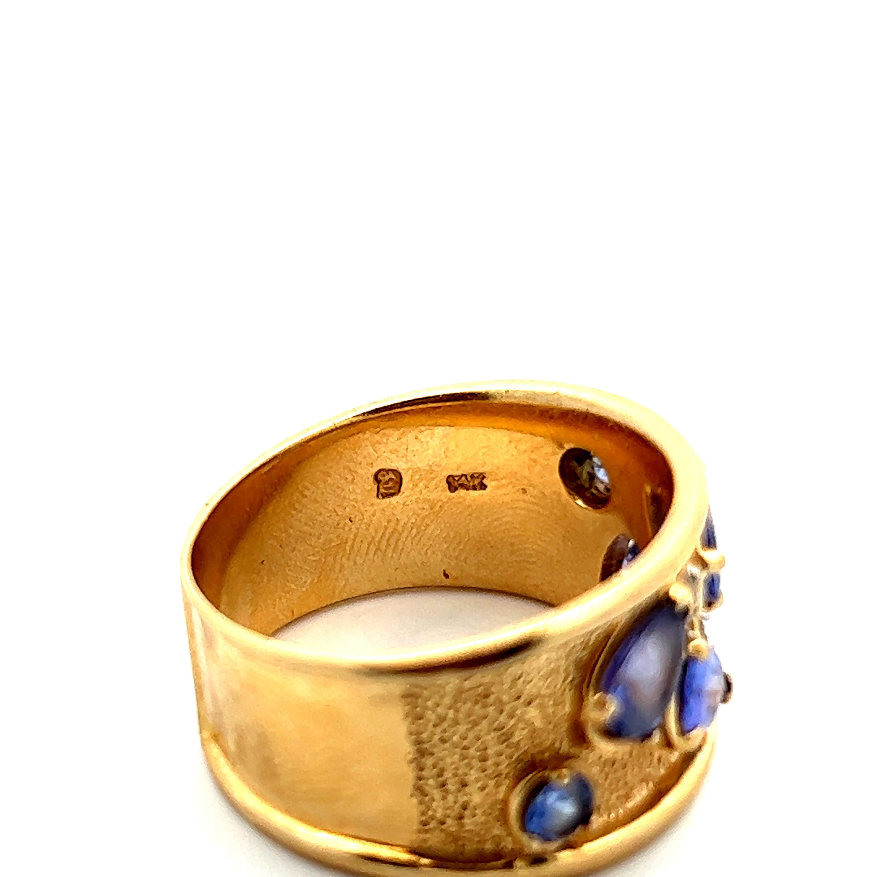 14K Yellow Gold Flat Ring w/ Mixed Shaped Tanzanite (Round + Pear) and Diamond  In Excellent Condition In Lexington, KY