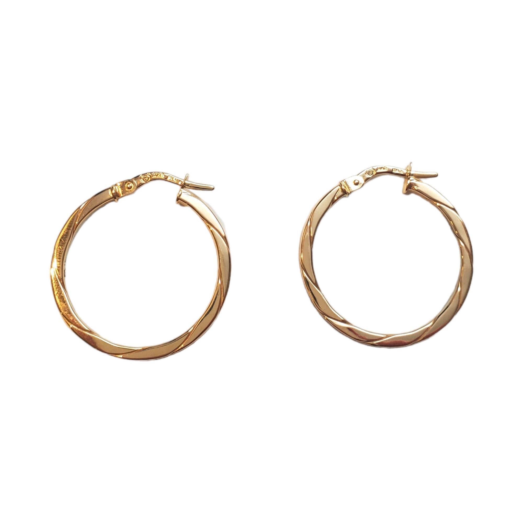 14K Yellow Gold Flat Twisted Hoops

Crafted from luxurious 14K yellow gold, these hoops feature a unique flat twisted design that adds a distinctive twist to a timeless style.

Hallmark: 14kt ITALY

Weight: 1.5 g/ 1.0 dwt.

Thickness: 1.9 mm