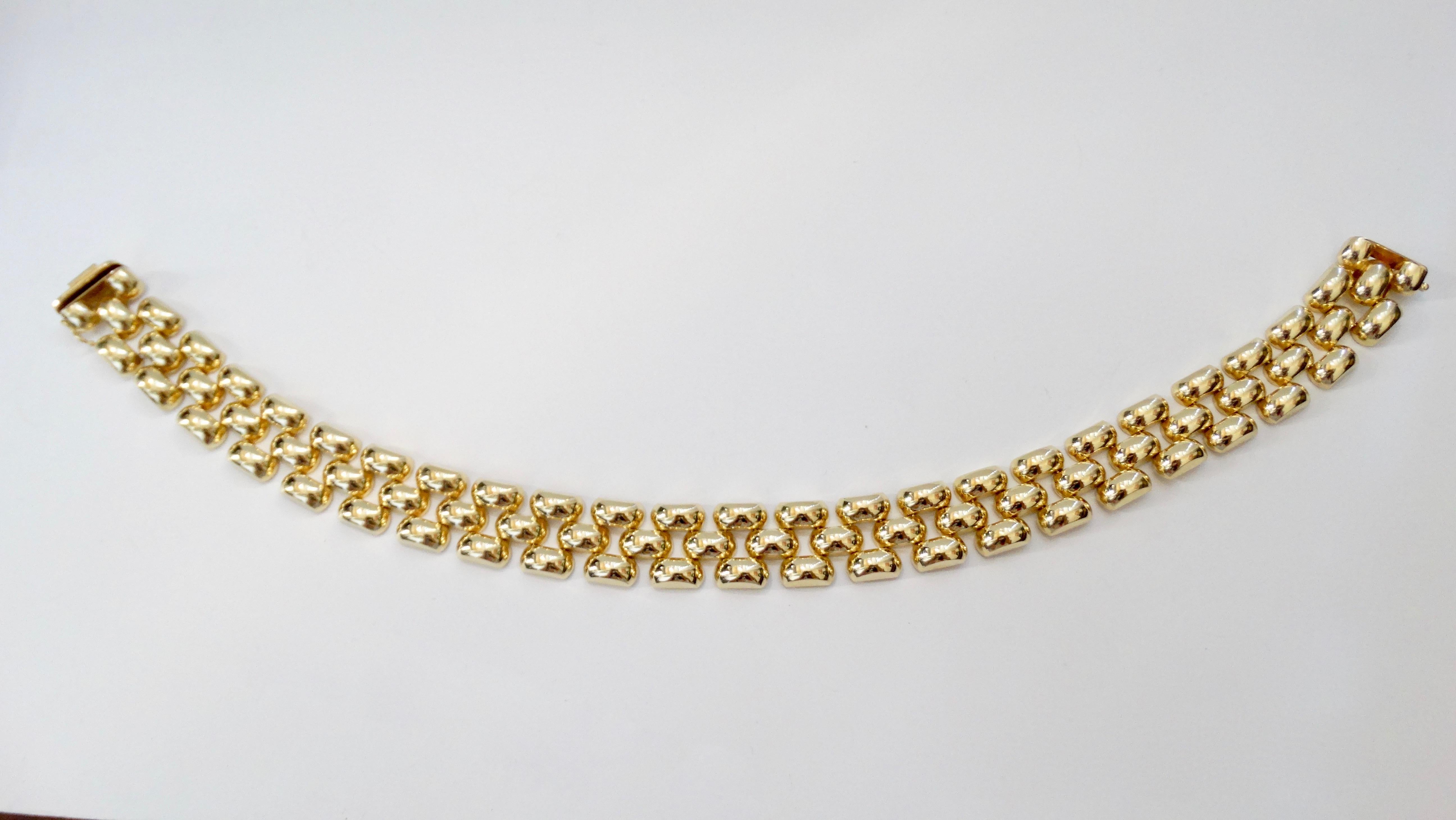 Gorgeous late 20th-century panther link necklace crafted from 14k Yellow Gold. Features 3 rows of links with very flexible movement, a box clasp closure and extra link. Total weight in grams is 97.04 and measures 17.5