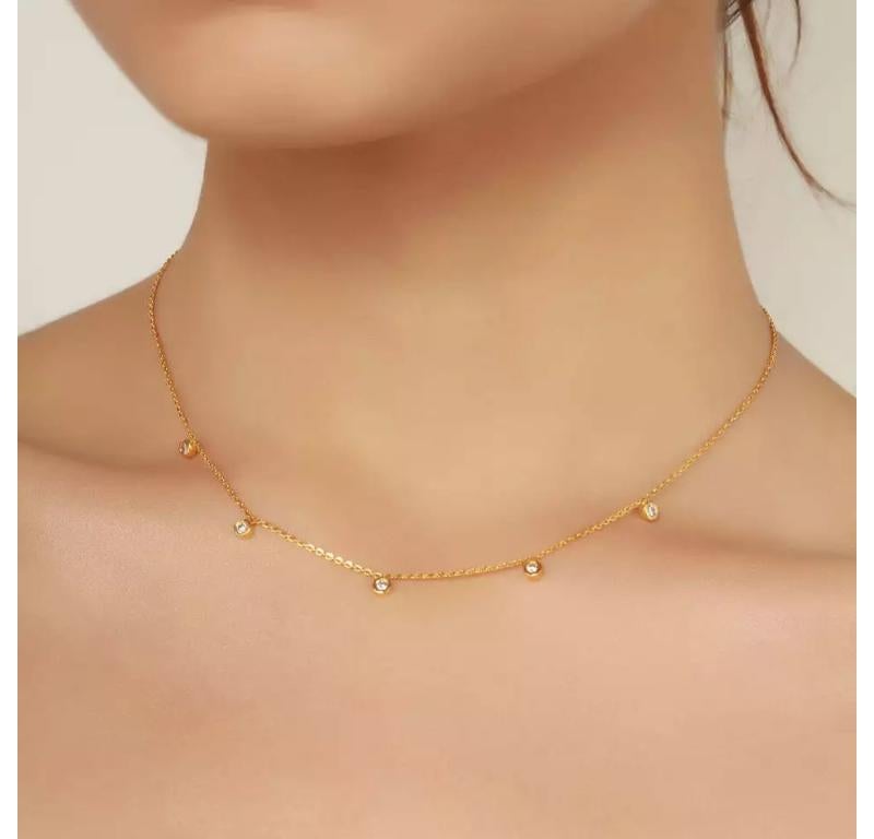 Halskette aus 14 Karat Gelbgold mit schwebenden Diamanten (Rundschliff) im Angebot