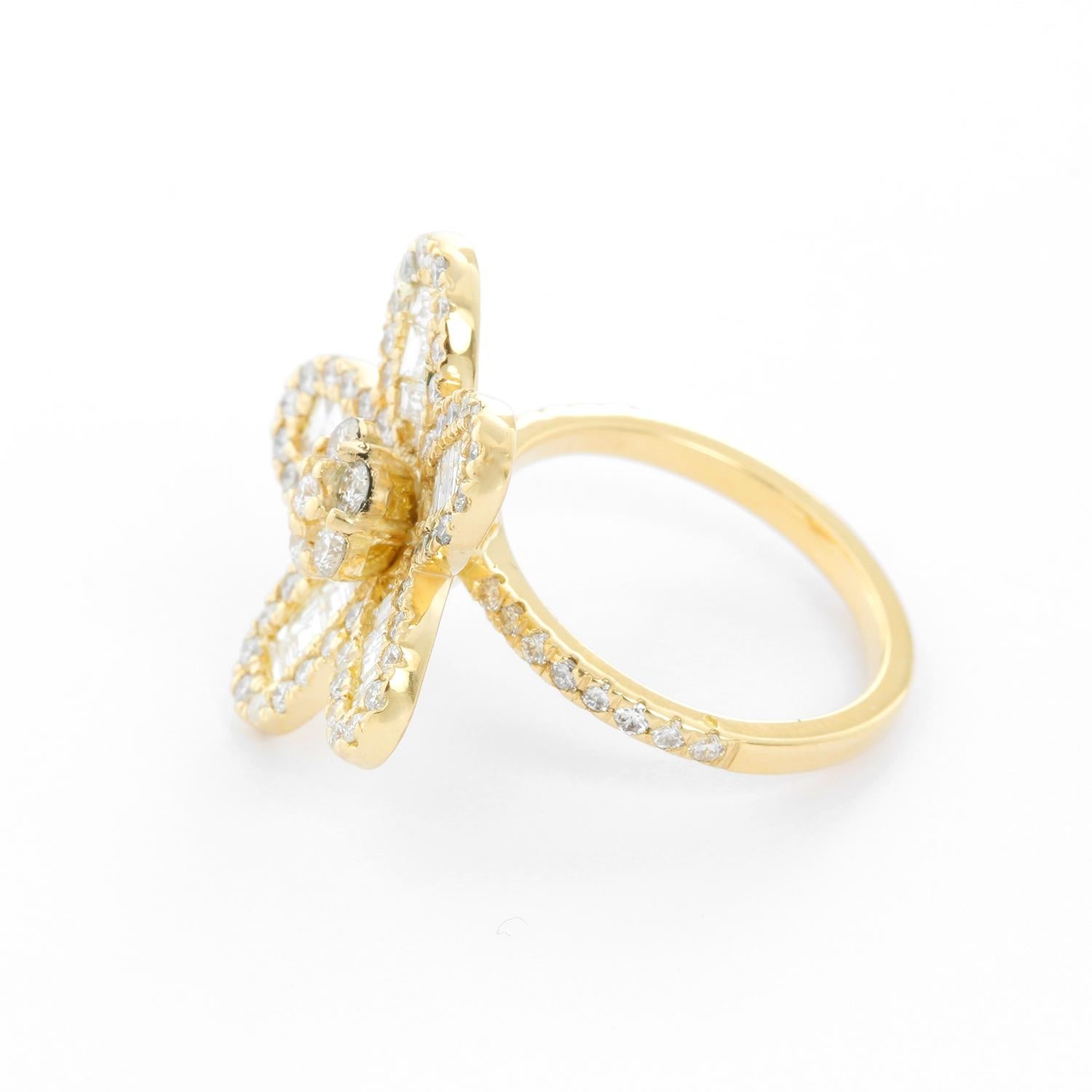 14K Yellow Gold Flower Diamond Ring Size 7 1/4 - Beautiful round brilliant diamonds and baguette cut diamonds  weighing 2 cts. Color G-H. Clarity SI/VS. Set in 14K Yellow gold with diamonds on the side. This is truly a stunning piece.