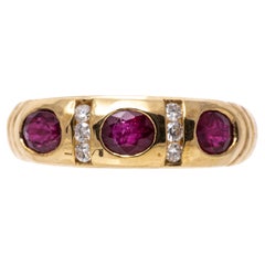 Retro 14k Yellow Gold Flush Set Ruby and Channel Diamond Band Ring