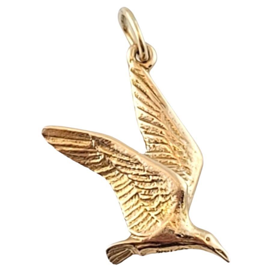 14K Yellow Gold Flying Bird Charm #14320 For Sale