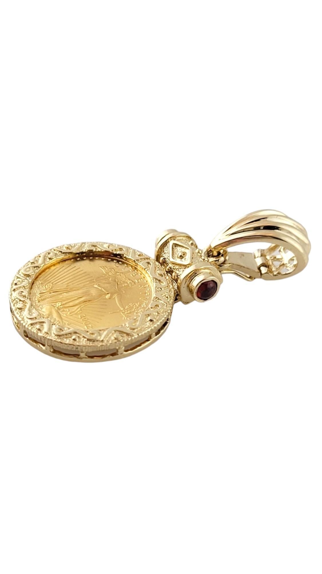 Vintage 14K Yellow Gold Framed Gold Eagle Pendant

This beautiful pendant features a 2002 1/10th oz. American Gold Eagle $5.00 coin with a 14K yellow gold frame with cabochon reddish-brown accents ono the hinge!

Size: 26.8mm X 20.4mm X