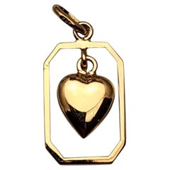 Colgante de corazón con marco de oro amarillo de 14K n.º 25681