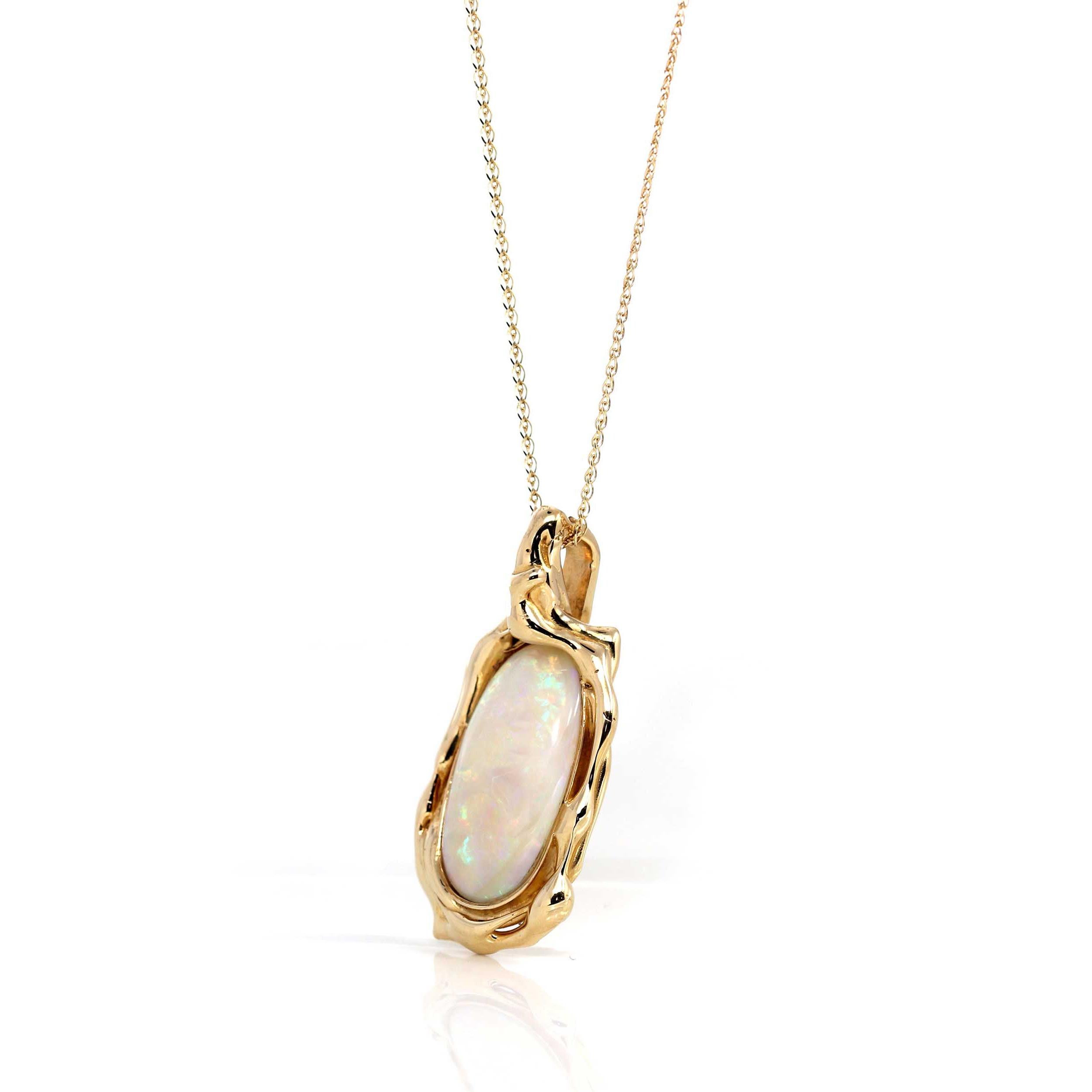 Design Concept--- Part of Baikalla's genuine gemstone jewelry collection. This beautiful genuine Australian opal's beauty is brought out by this gorgeous freeform bezel-set mounting. This is truly a piece for gemstone lovers. Pair with a natural