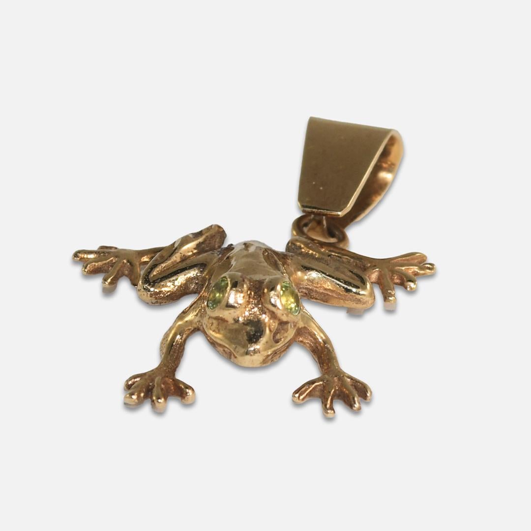 Pendentif grenouille en or jaune 14k.
Estampillé 14k, testé à 53% de pureté au pistolet à rayons X.
Poids : 5,3 grammes.