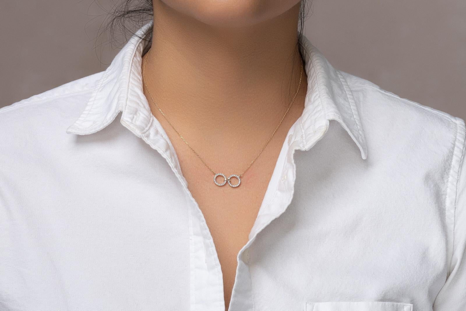 This geo art necklace is subtle but striking. A beautiful diamond necklace that catches attention without overpowering. The essence of elegant every day fine jewelry. The diamond necklace in 14k yellow gold is perfect to gift someone you share a
