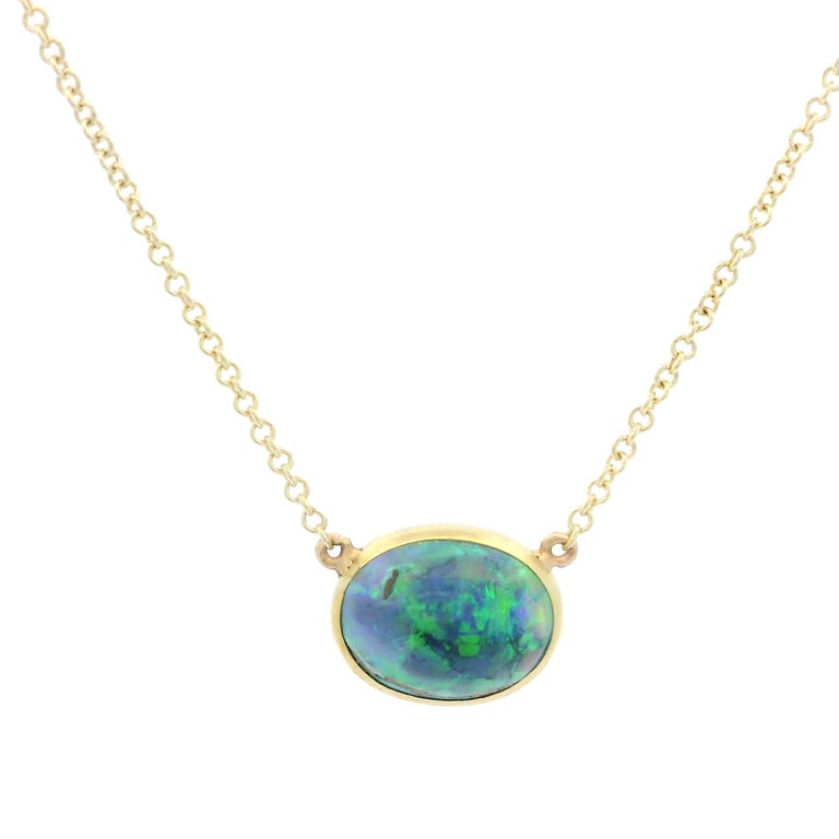14k Yellow Gold GIA Oval Bezel Set Black Opal Pendant