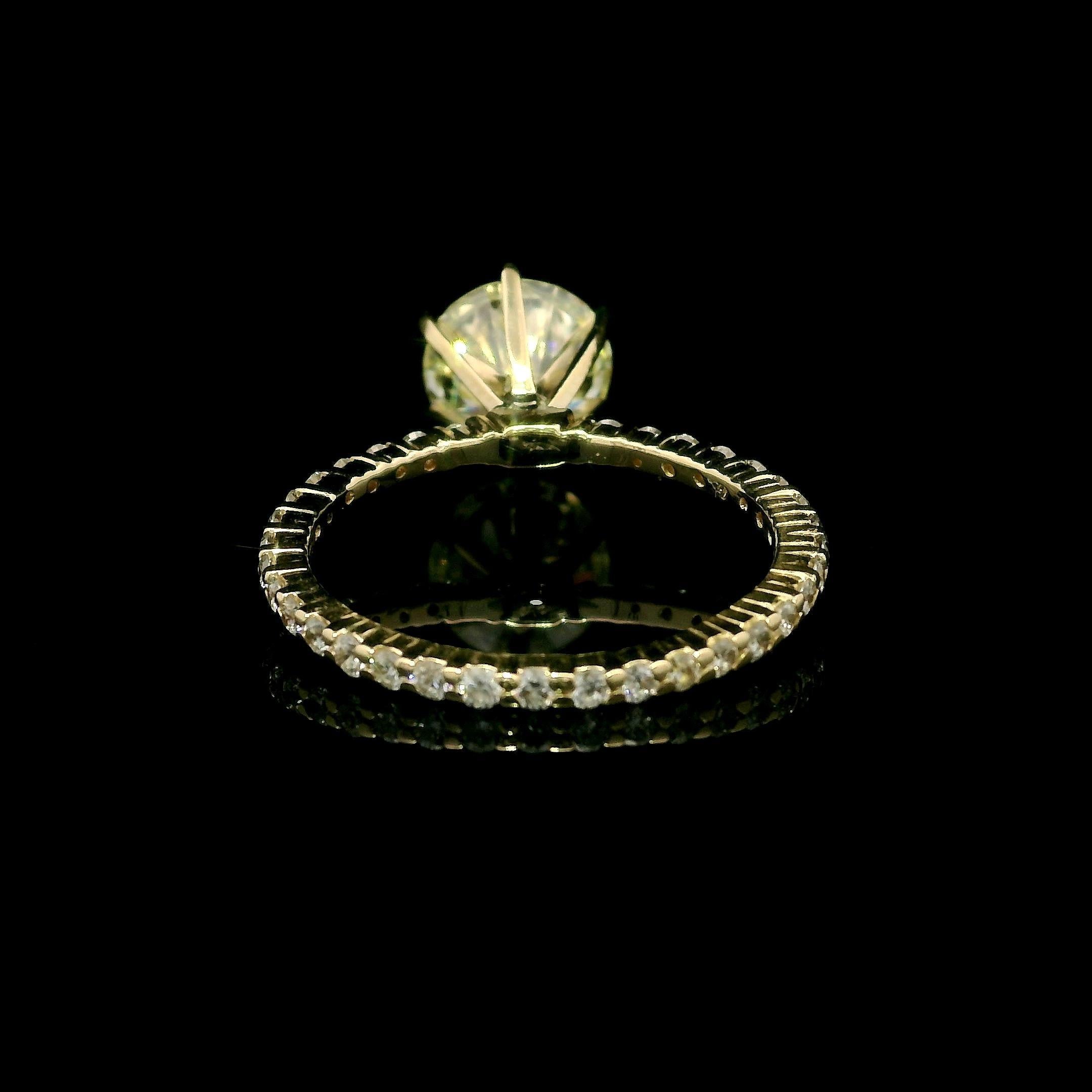 --Stone(s):--
(1) Natural Genuine Diamond - Round Brilliant Cut - Prong Set- Light Yellow Q/R Color - VS1 Clarity - Very Very Fiery - 2.09ct (exact - certified)
** See Certification Details Below for Complete Info **
(34) Natural Genuine Diamonds -