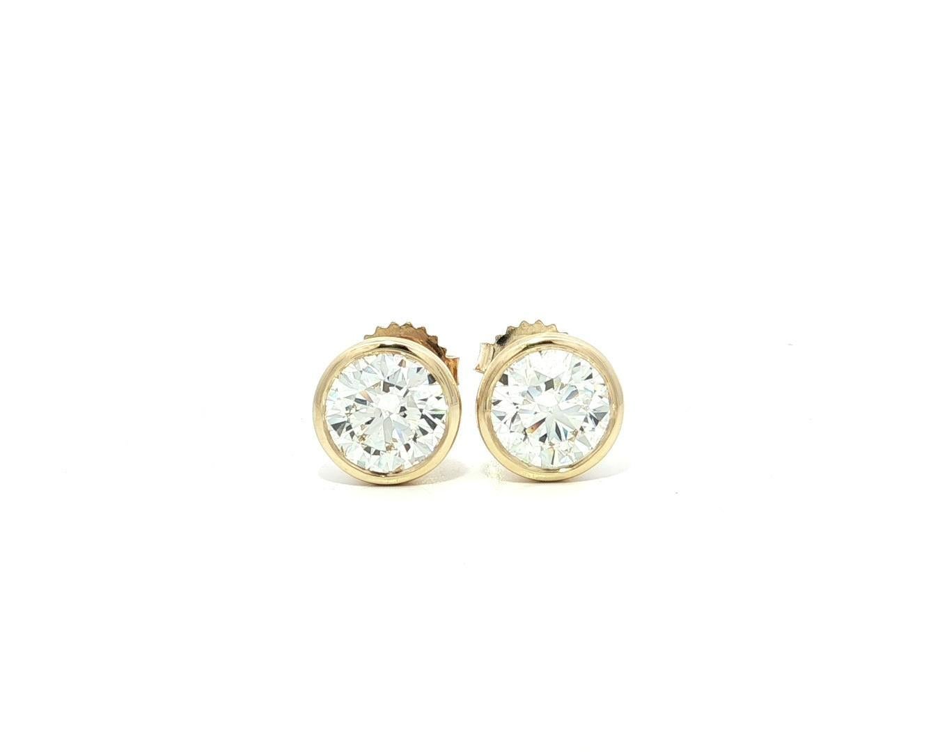 Classic Matching GIA Martini Bezel Natural Diamonds Stud Earrings. 

--Stone(s):--
(2) Natural Genuine Diamonds - Round Brilliant Cut - Martini Bezel Set - J Color - SI1 Clarity - 3.08ctw (exact - certified)
** See Certification Details Below
