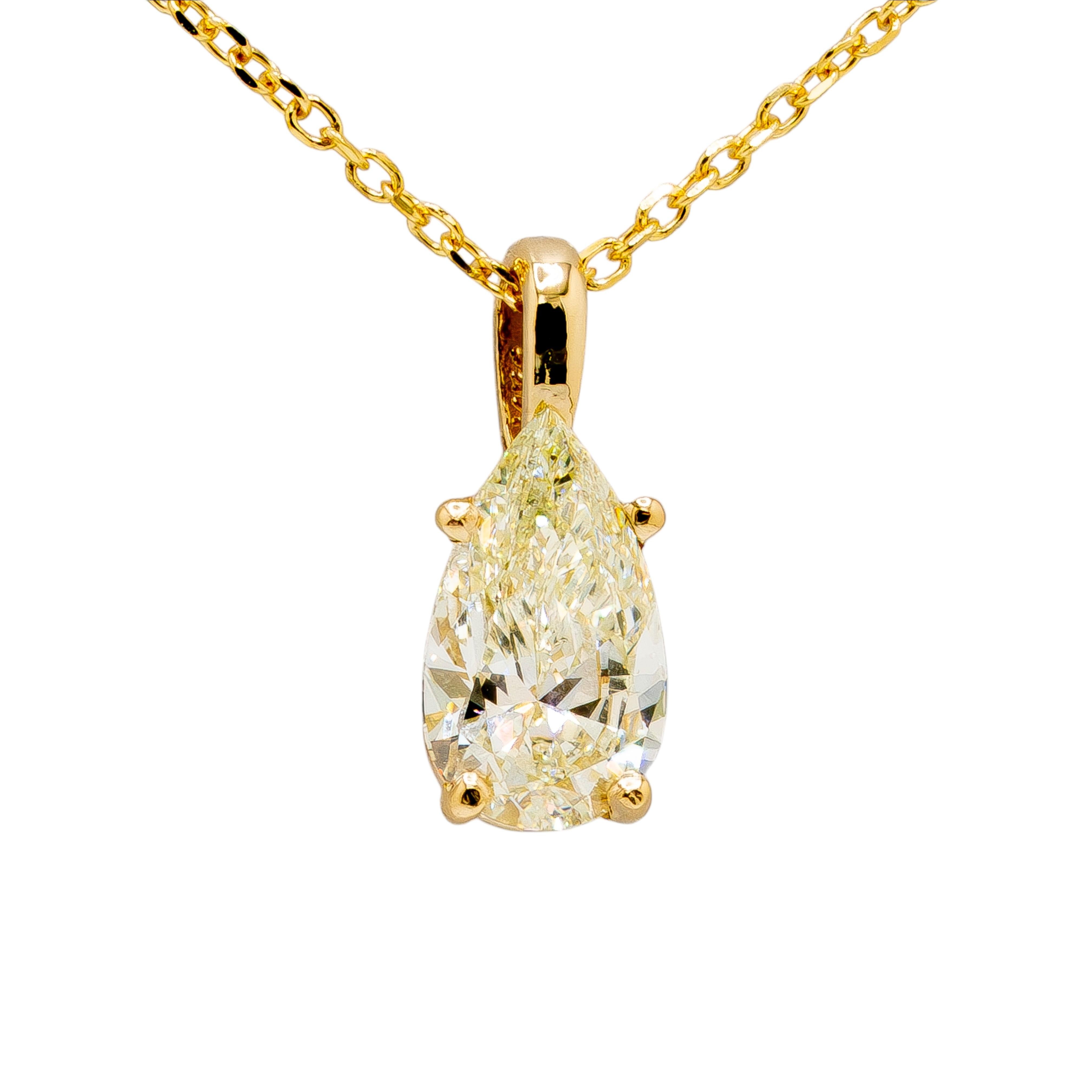 This 14k Yellow Gold Cable Link Chain Necklace is a delicate and refined piece, perfect for showcasing its standout feature—a 1.00ct Natural Pear Shape Diamond. The diamond, graded N in color and SI2 in clarity, adds a distinctive, warm sparkle,