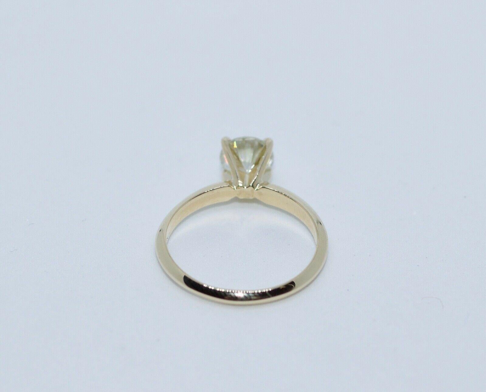 Round Cut 14 Karat Yellow Gold GIA Round Brilliant Diamond .92 Carat N-Si2 Solitaire Ring