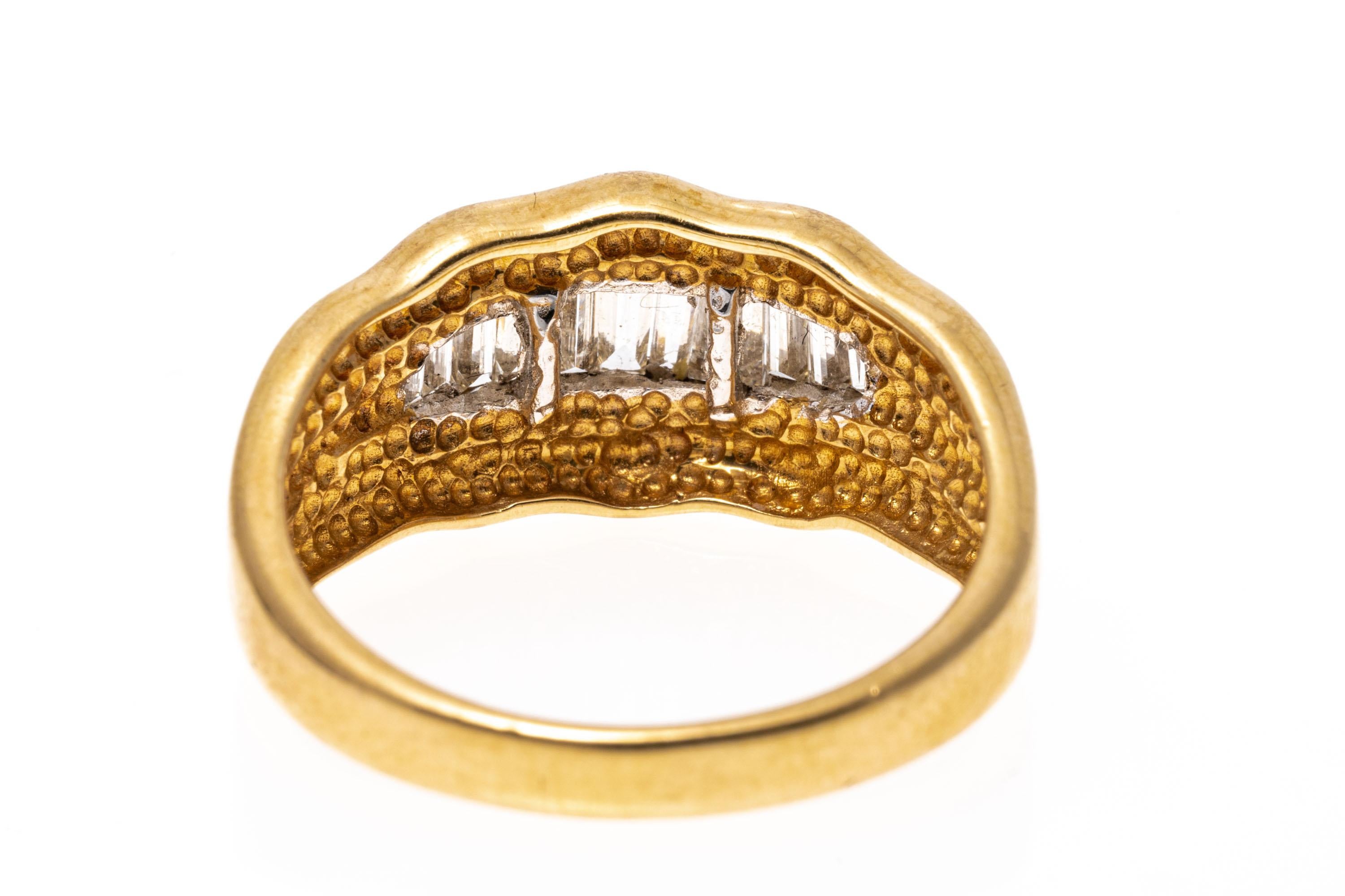 Contemporary 14k Yellow Gold Graduated Baguette Diamond Ring With Scalloped Edge For Sale