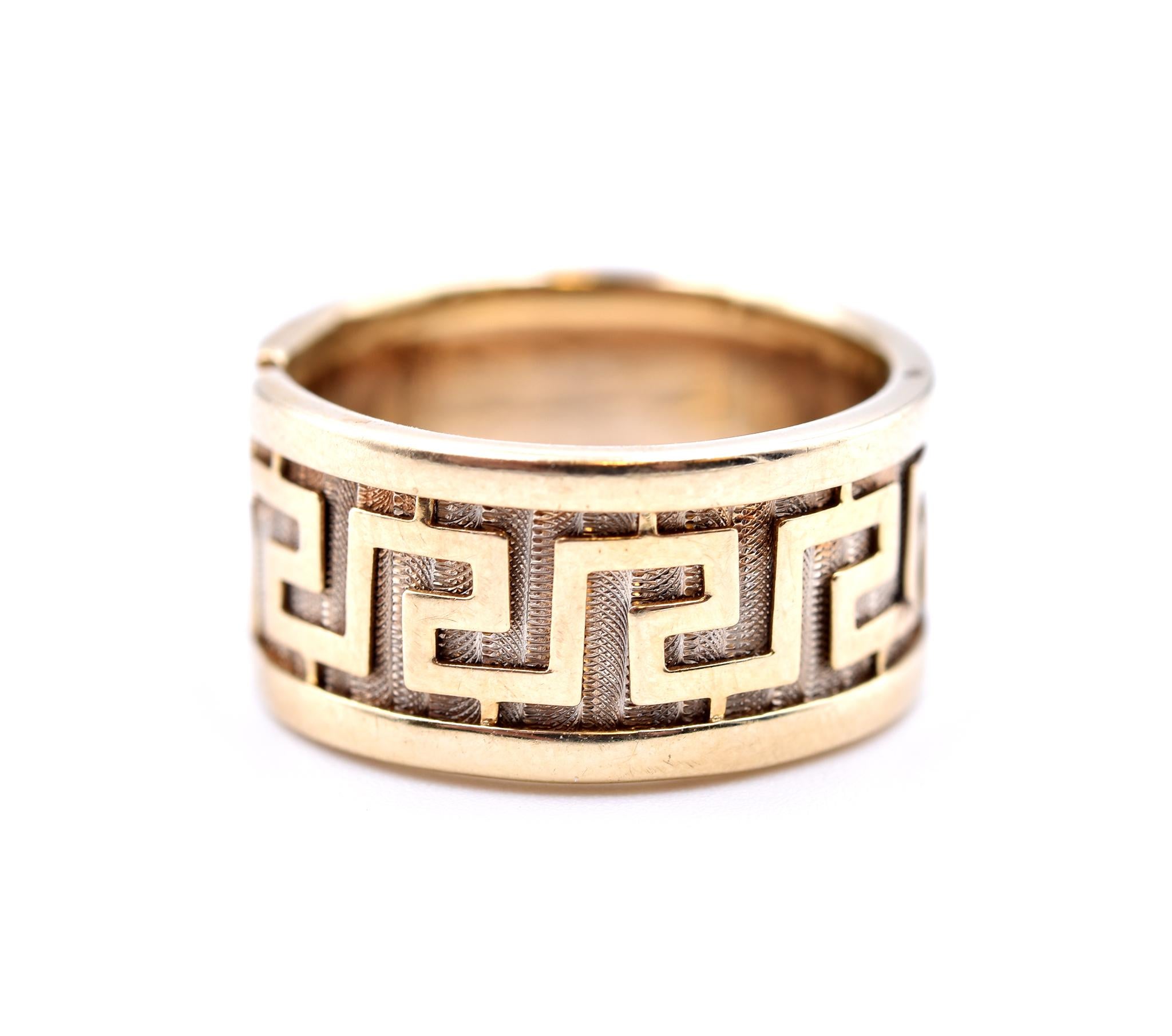 Designer: custom design
Material: 14k yellow gold
Ring size: 7 ¼ 
Dimensions: ring is 10mm wide 
Weight: 6.60 grams 
