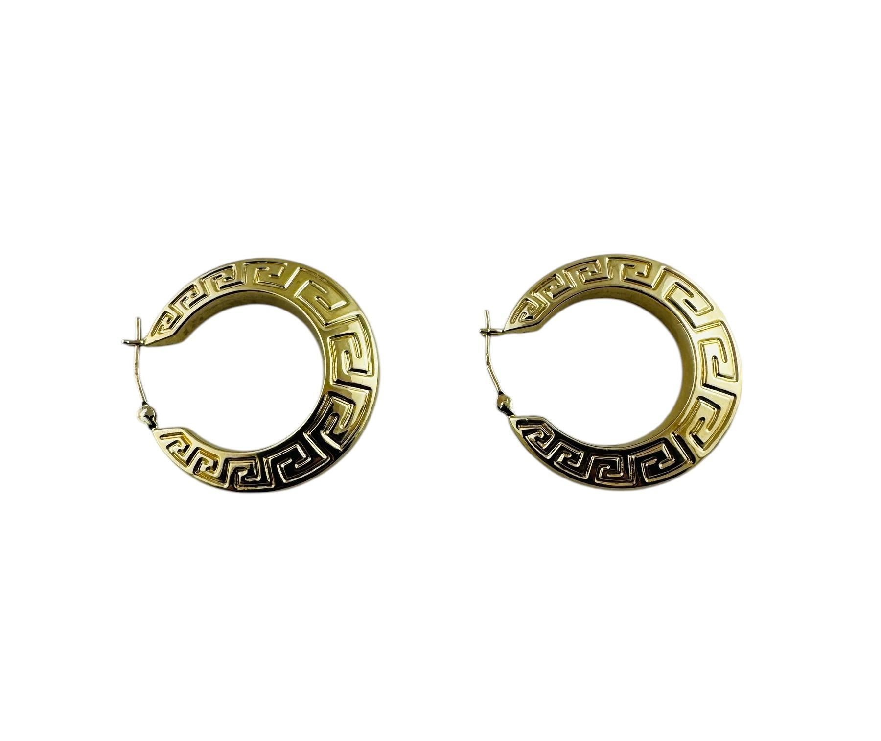 14K Yellow Gold Key Patterned Hoop Earrings

These lovely circular hoop earrrings are set in 14K yellow gold and feature a greek key pattern sign

Stamped Ma 14K

Measurements: 28.2 mm in length, 27.26 mm wide, 5. 33 mm thick

3.46 g / 2.22