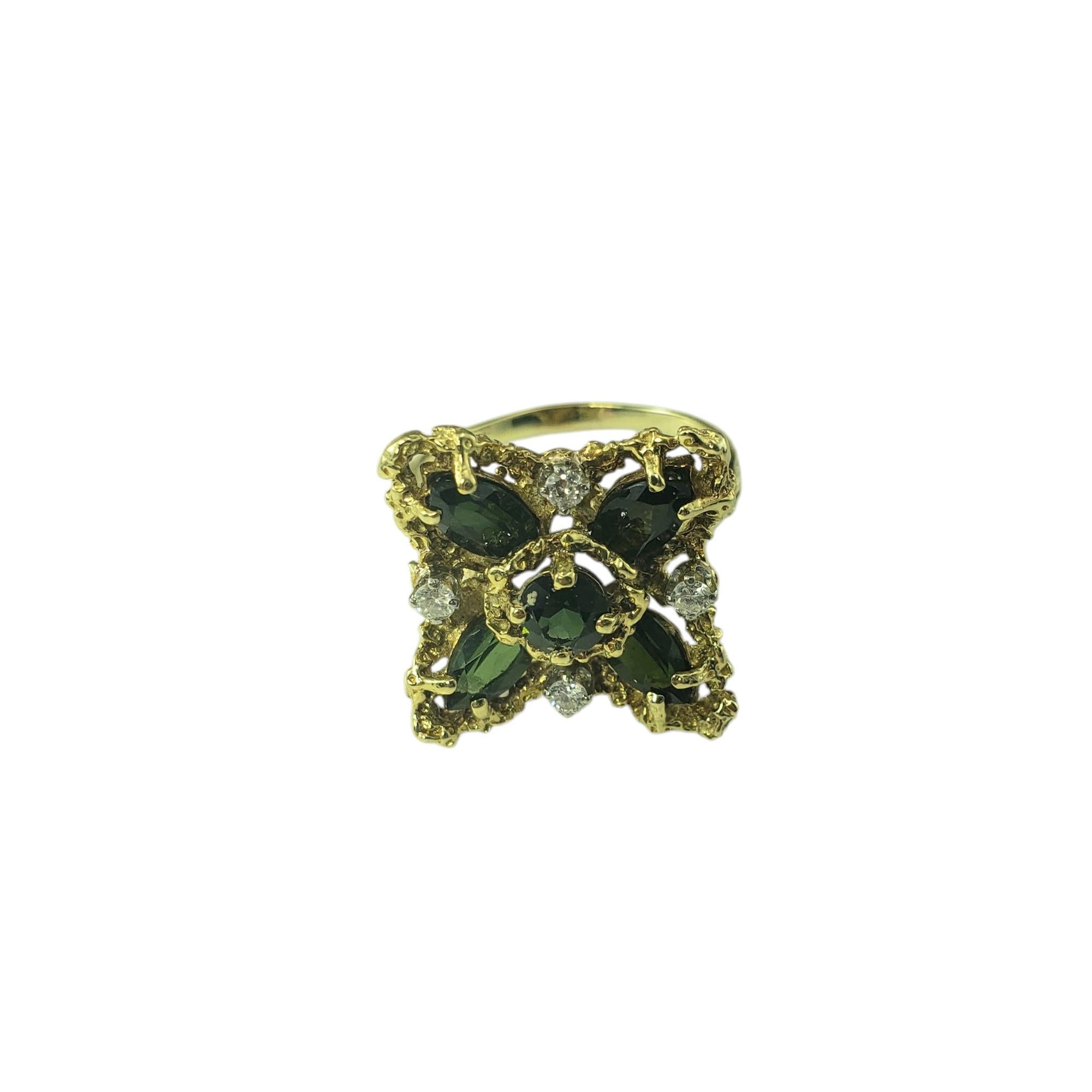 14 Karat Yellow Gold Green Tourmaline and Diamond Ring Size 9.25 JAGi Certified-

This stunning ring features four marquis cut green tourmalines and one round green tourmaline accented with four round brilliant cut diamonds. Set in a beautifully