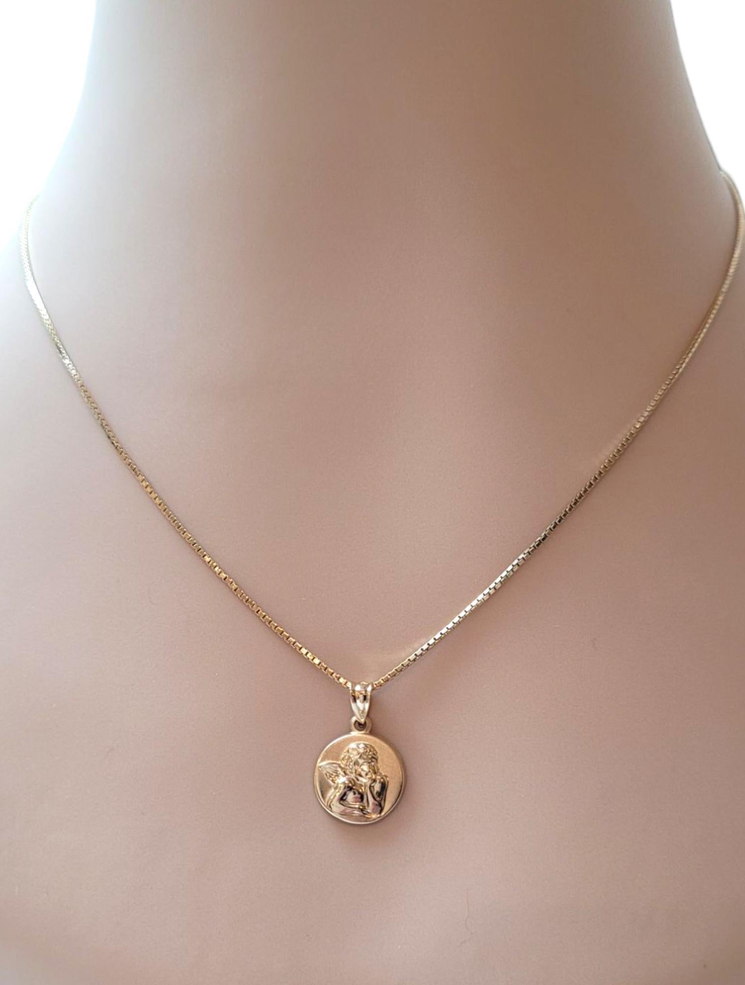 14K Yellow Gold Guardian Angel Pendant

This lovely hollow pendant depicts a guardian angel on one side and 