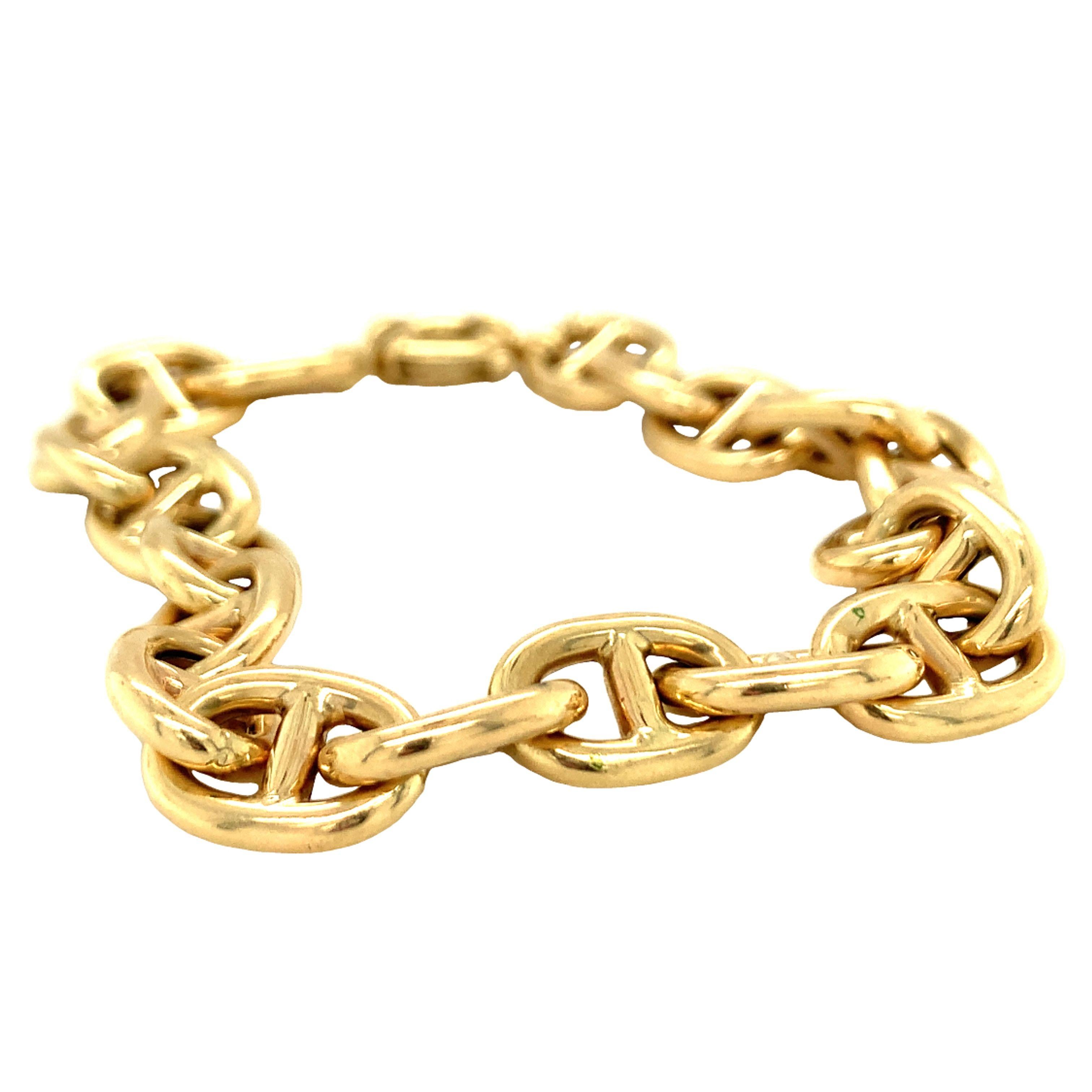 One 14K yellow gold Gucci style puff link bracelet measuring 10 mm. wide and 8.5 inches long. Stamped: “14K, Italy, MMI” and weighs 12.3 grams.

Statement, chunky, golden.

Metal: 14K yellow gold
Circa: 1970s
Stamp/Hallmark: 14K, Italy,