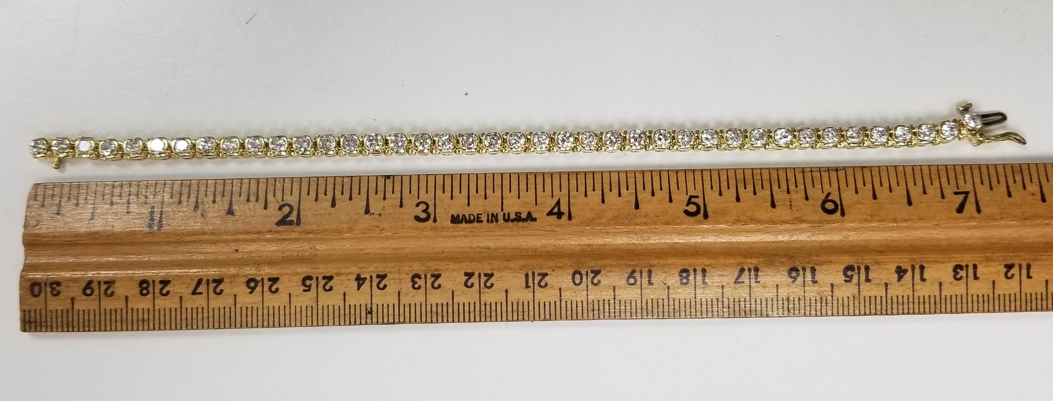 14 Karat Yellow Gold Half Bezel Set Diamond Tennis Bracelet Weighing 5.00 Carat 1