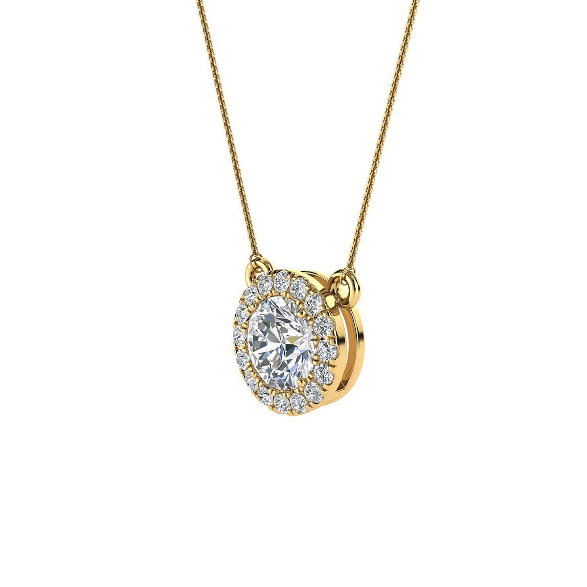 This delicate pendant features one round shaped diamonds that are approximately 0.54-carat total weight (5.2 mm) encircled by a halo of perfectly matched 16 brilliant round diamonds in about 0.17-carat total weight. The earrings are measuring at 8.6