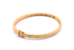 14 Karat Yellow Gold Hammer Diamond Bangle Bracelet