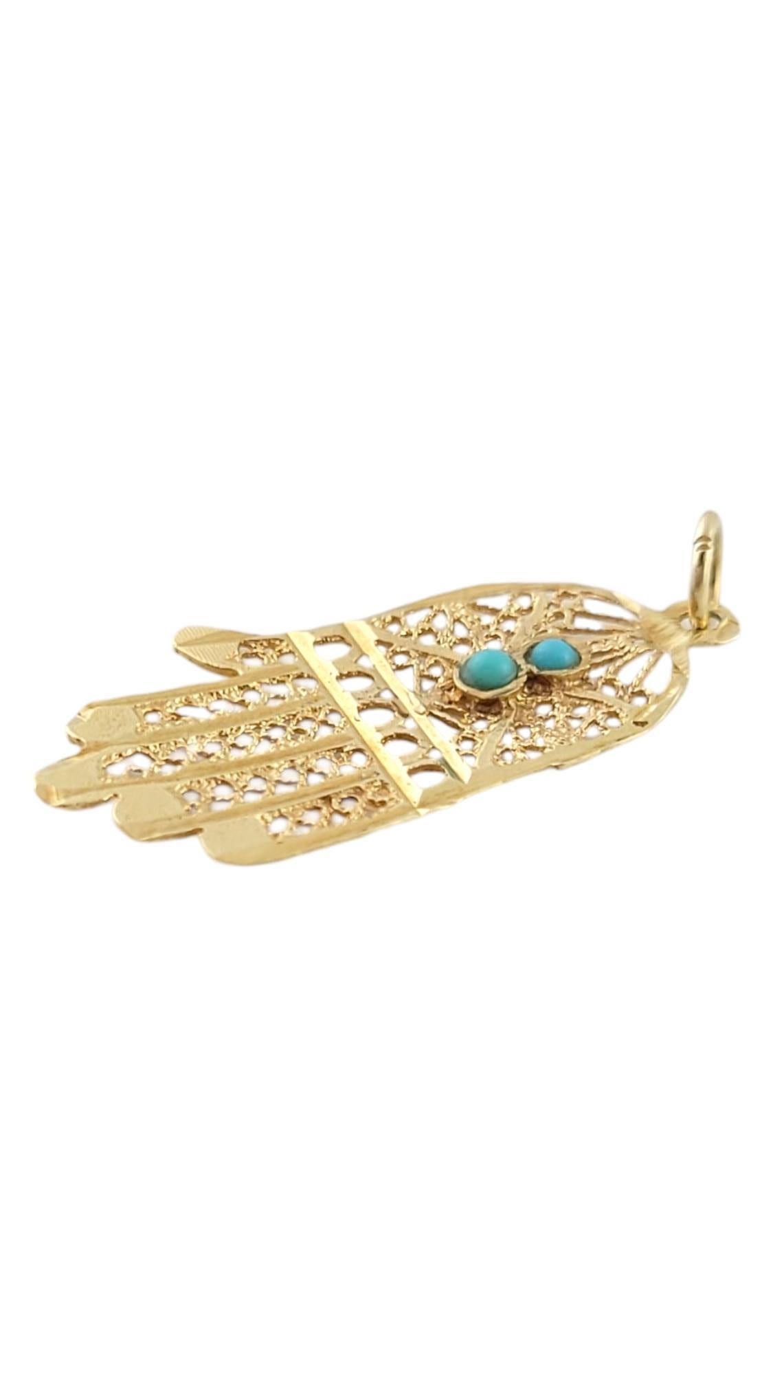 Vintage 14K Yellow Gold Hamsa Hand Charm with Turquoise Stones

This gorgeous charm is crafted with beautiful detail from 14K yellow gold and features 2 stunning turquoise stones!

Size: 28.84mm X 14.2mm X 1.87mm
Length w/ bail: 32.37mm

Weight:
