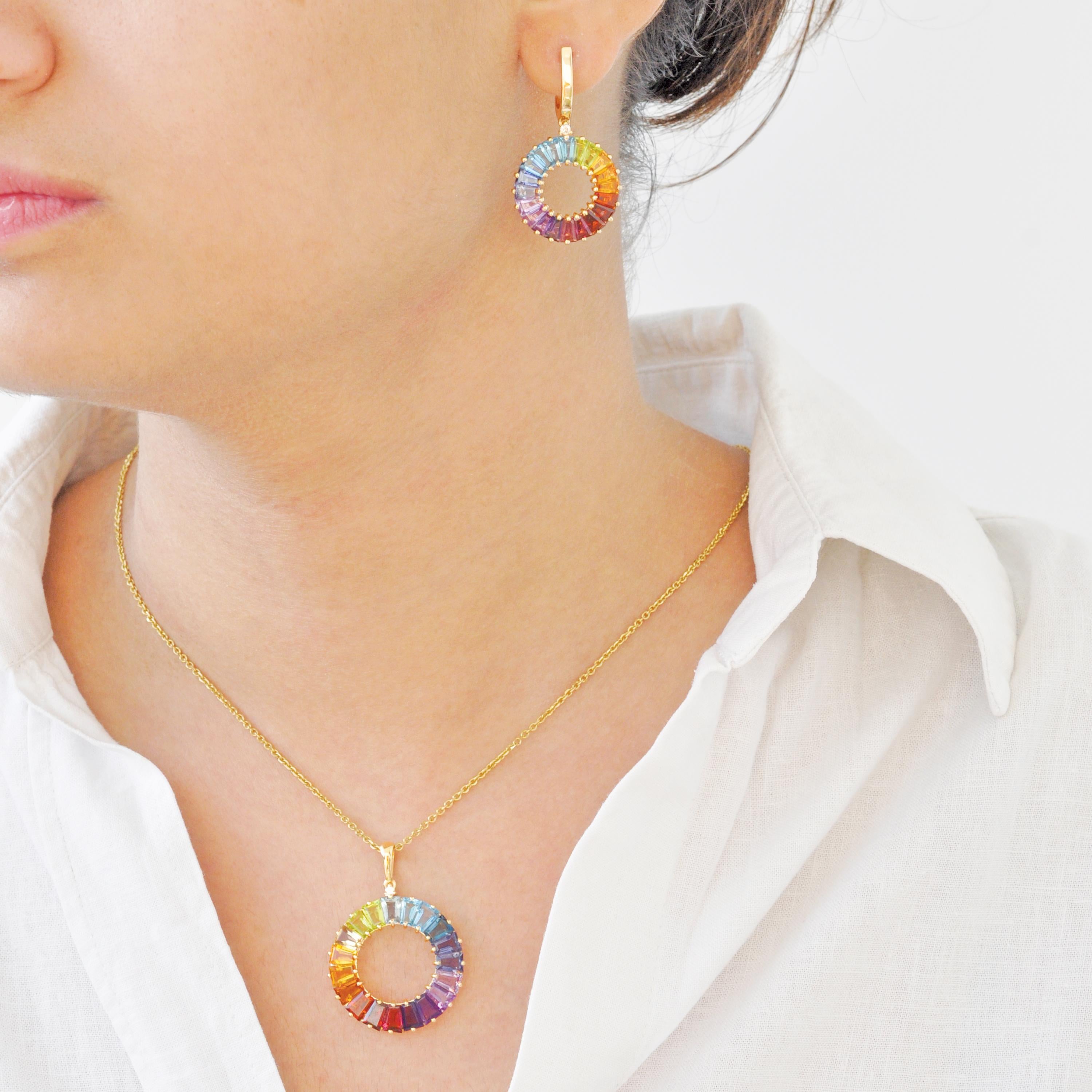 14K Gold Rainbow Pendant and Earrings Set with Natural Tapered Baguette Gemstones and Diamond Accents. 

Celebrate color and craftsmanship with this radiant 14-karat gold pendant and matching earrings set, designed to bring elegance and joy to any