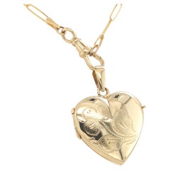 Vintage 14K Yellow Gold Heart Locket with Engraved Clover and Elongated Chain