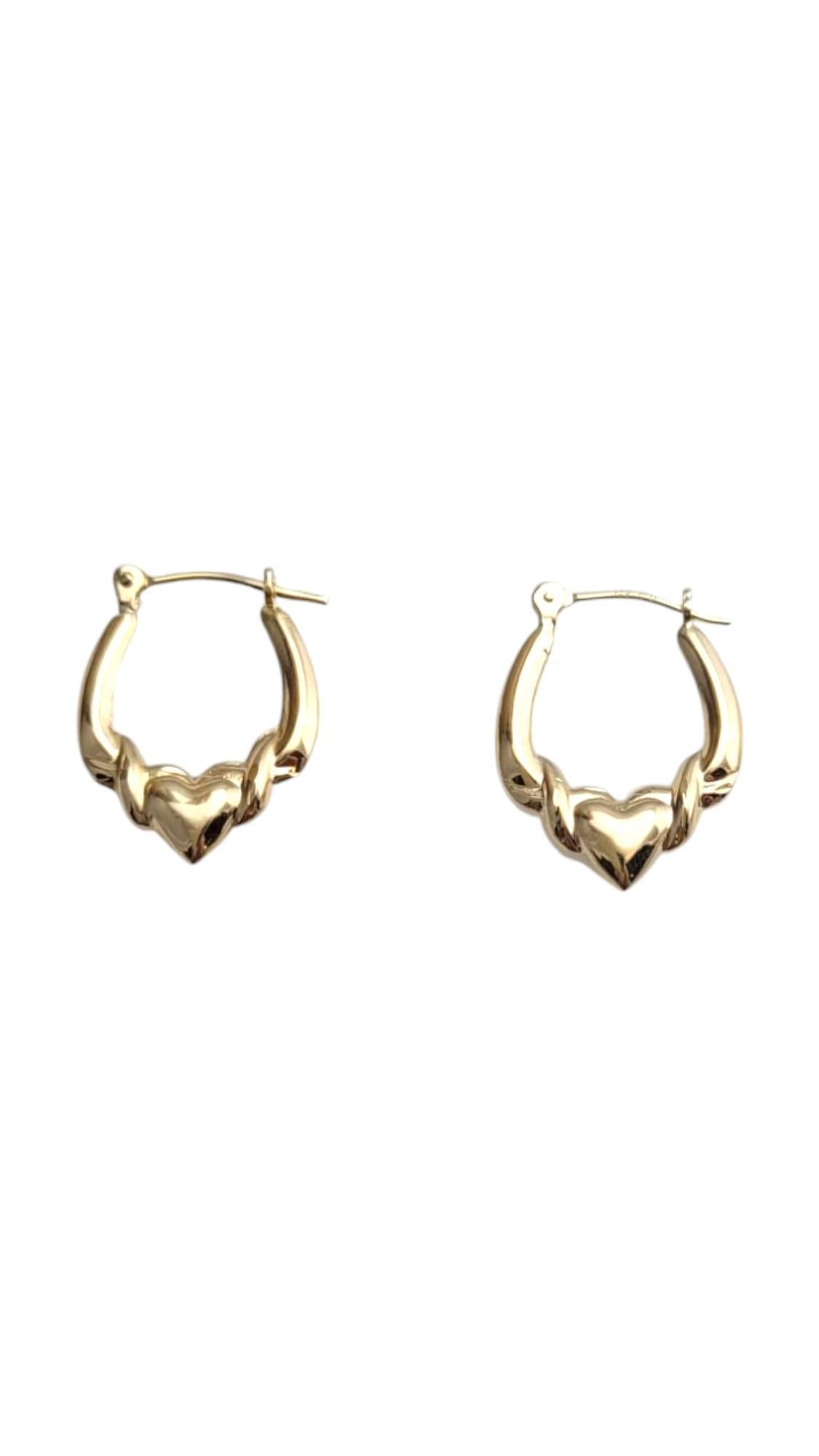 14K Yellow Gold Heart Oval Hoop Earrings

Love is always in the air with these adorable hoop earrings! Crafted in radiant 14K yellow gold, these lovely hoops feature a heart design in their centers.

Hallmark: 14K ION

Weight: 0.94 g / 0.6