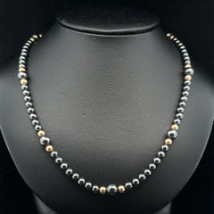Collana Ball and Ball in oro giallo 14k e ematite con gancio e chiusura a pressione