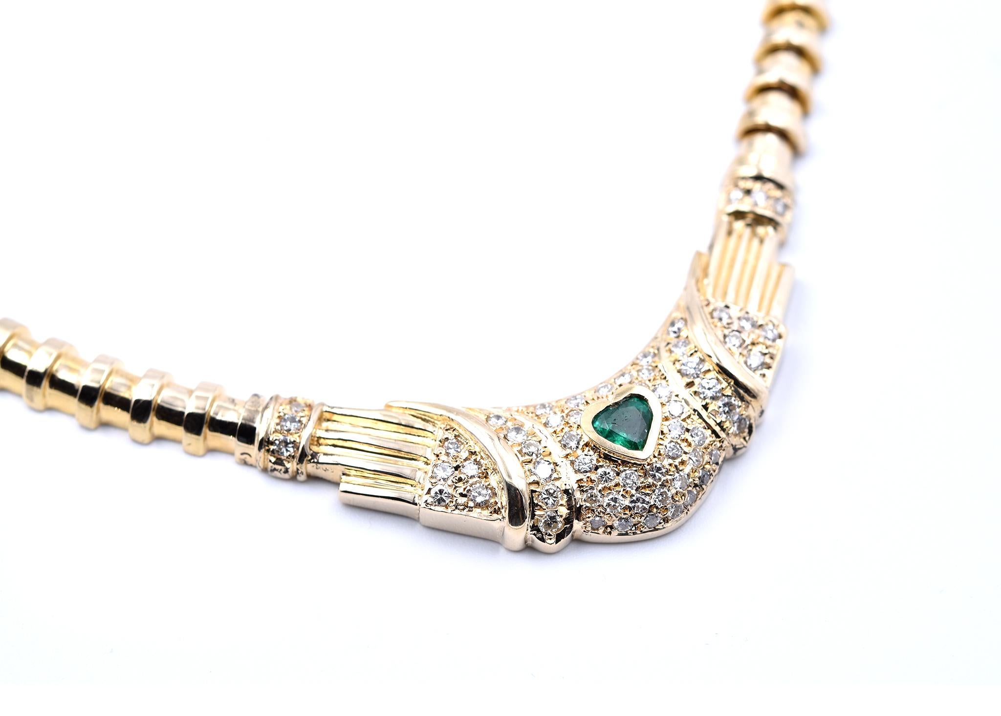 Designer: Herringbone
Material: 14k yellow gold
Diamonds: 60 round brilliant cuts = 1.50cttw
Color: H
Clarity: SI1	
Emerald: 1 heart cut emerald center stone=.33ct
Dimensions: necklace is 17-inches in length and 14.25mm in width
Weight: 65.07 grams
