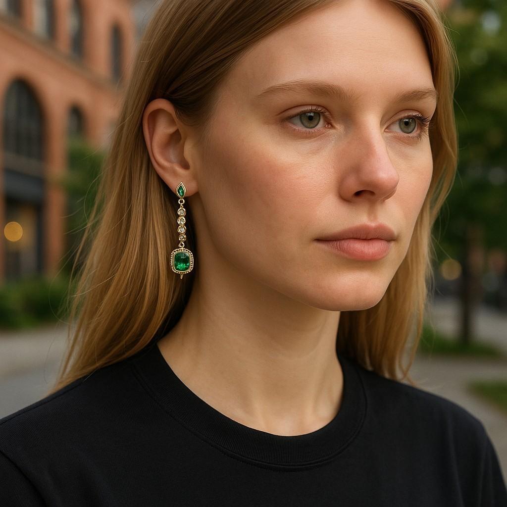 Emerald Cut 14K Yellow Gold High Jeweled Earrings 1.35 Inch Long Emerald and Diamond Accents For Sale