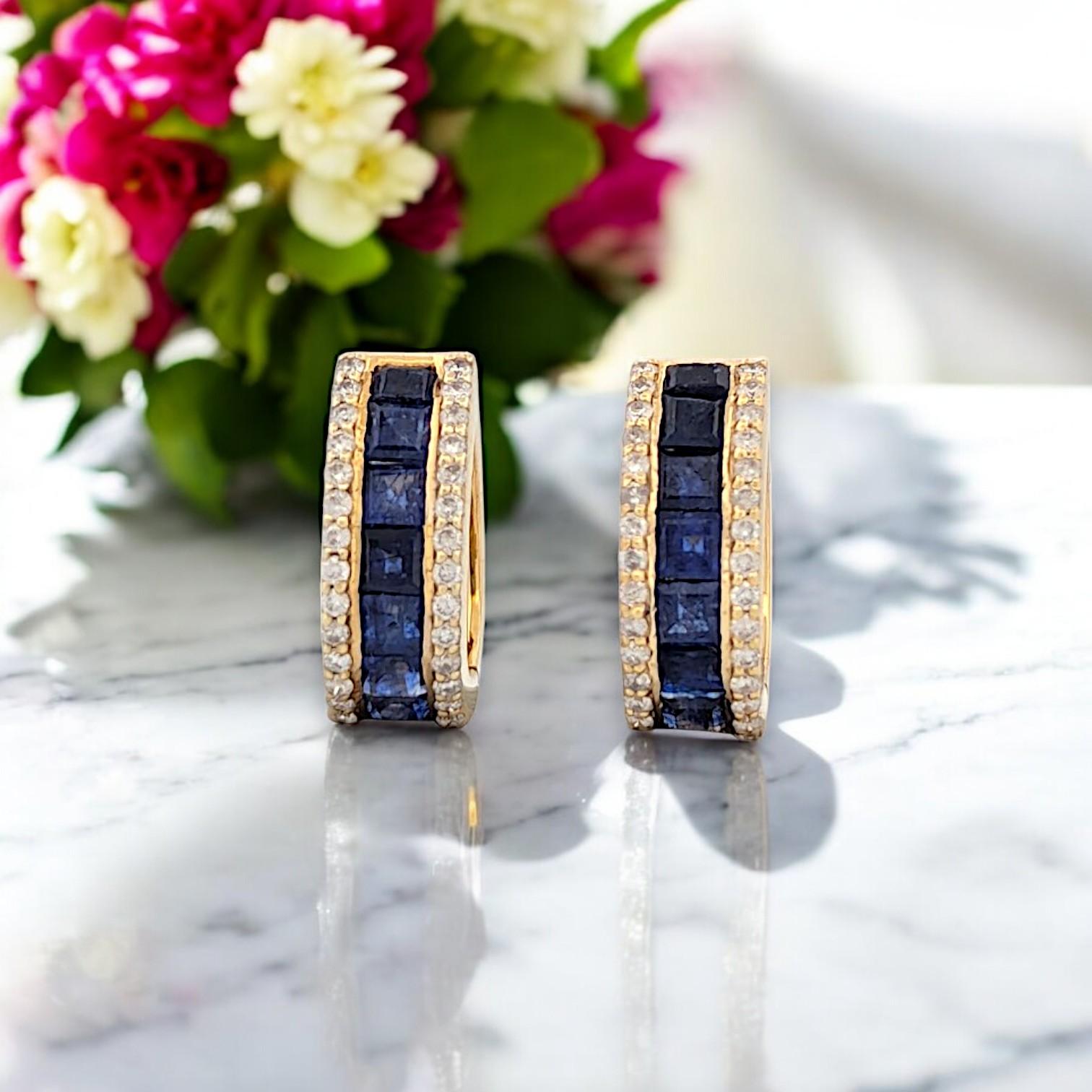 Make a statement with these bold and beautiful 14K yellow gold hinge hoop earrings, featuring 2.0 carats of natural baguette sapphires and .40 carat total weight of sparkling round diamonds. The sleek baguette cuts create a striking line of deep