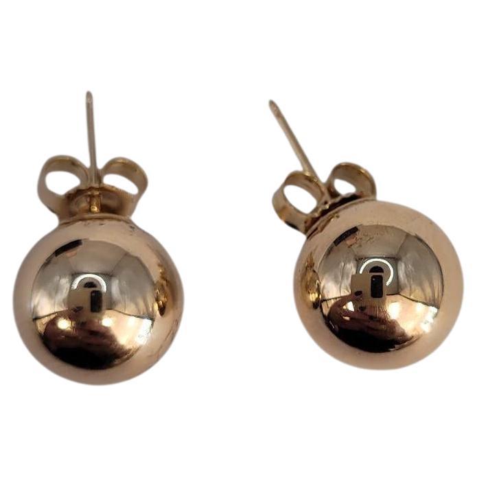 Boucles d'oreilles en or jaune 14K avec des boules creuses de 9.5mm #23209