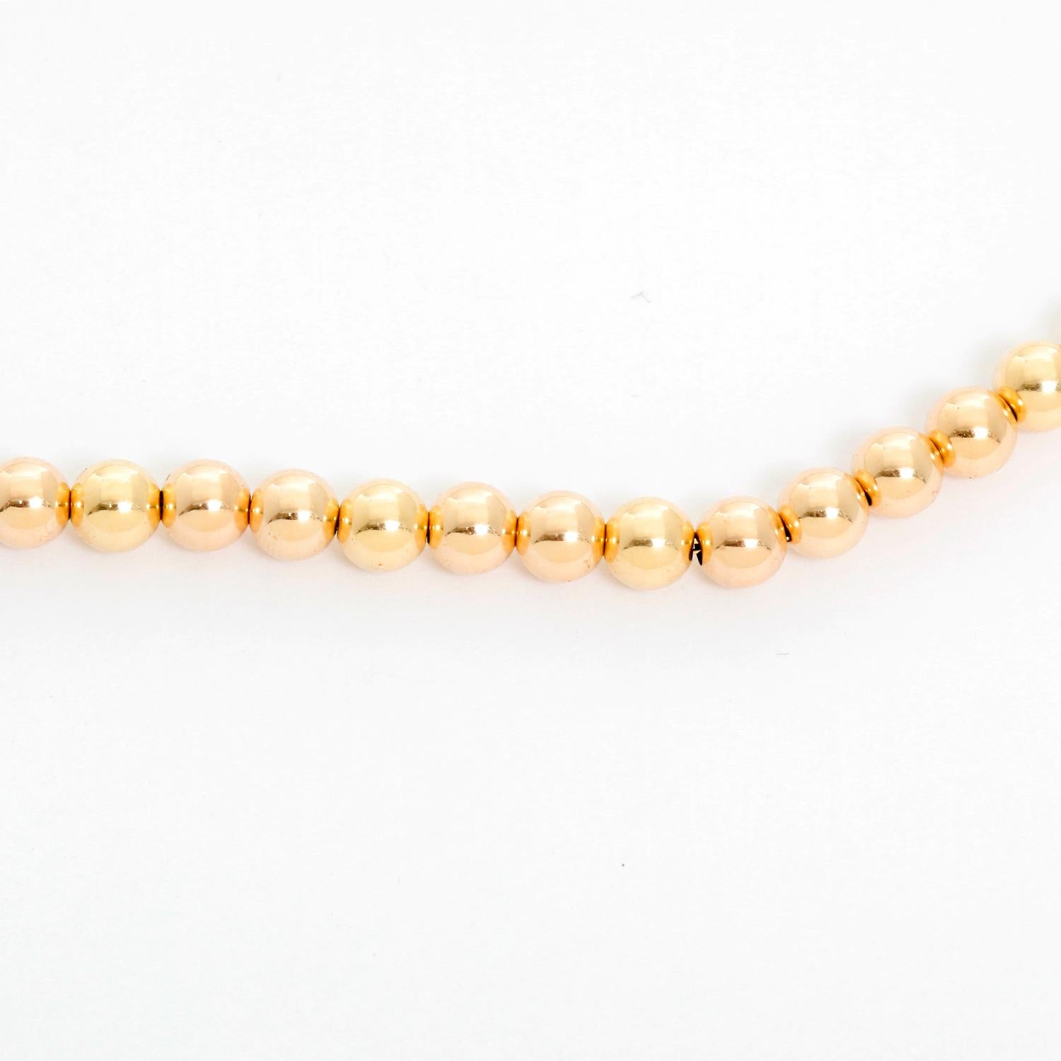 14K Yellow Gold Hollow Bead Necklace - Beautiful 14K Yellow gold bead necklace.  5 MM  beads . Total length 18 inches. Total weight 5.1 grams.  Perfect for layering!