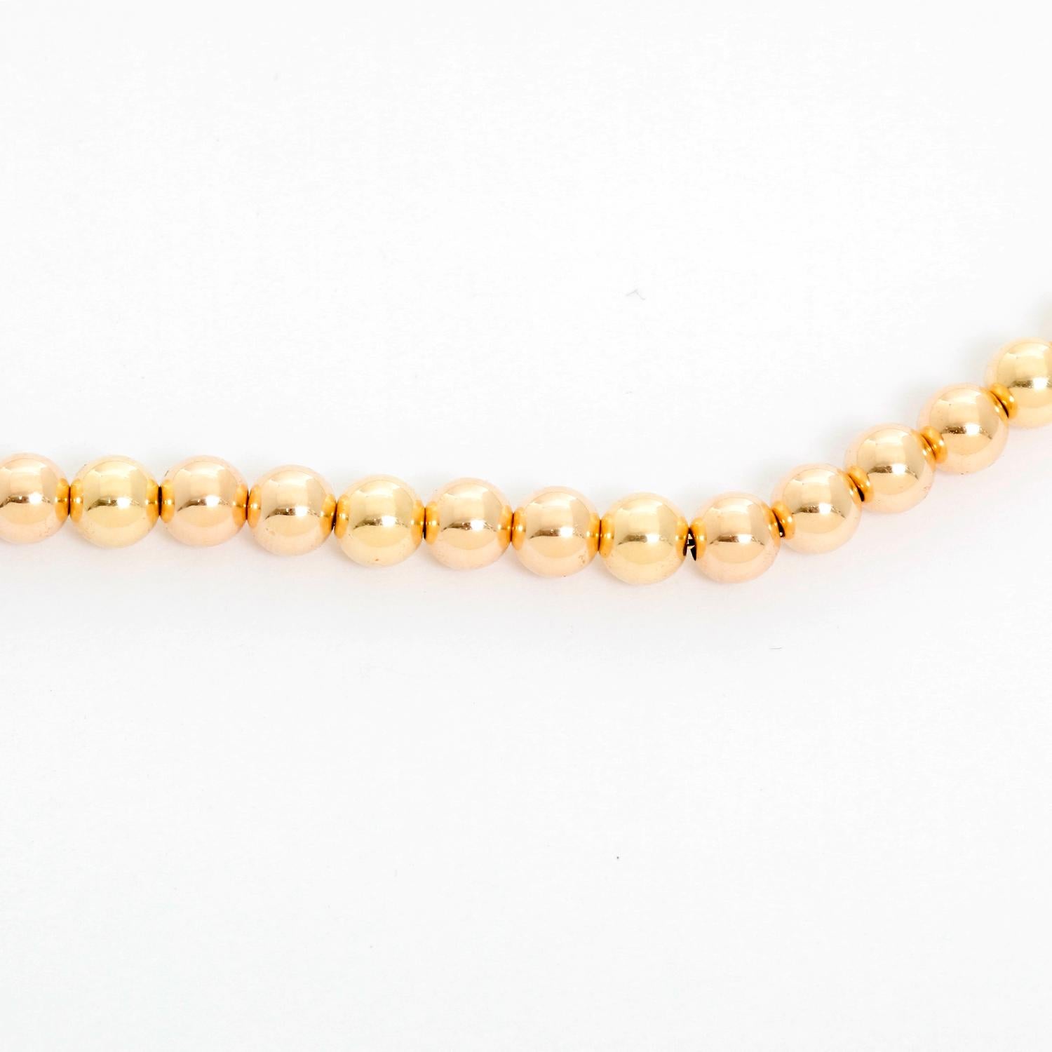 Collana di perle cave in oro giallo 14K - Bellissima collana di perle in oro giallo 14K.  5 MM  perline . Lunghezza totale 18 pollici. Peso totale 5,1 grammi.  Perfetto per la stratificazione!