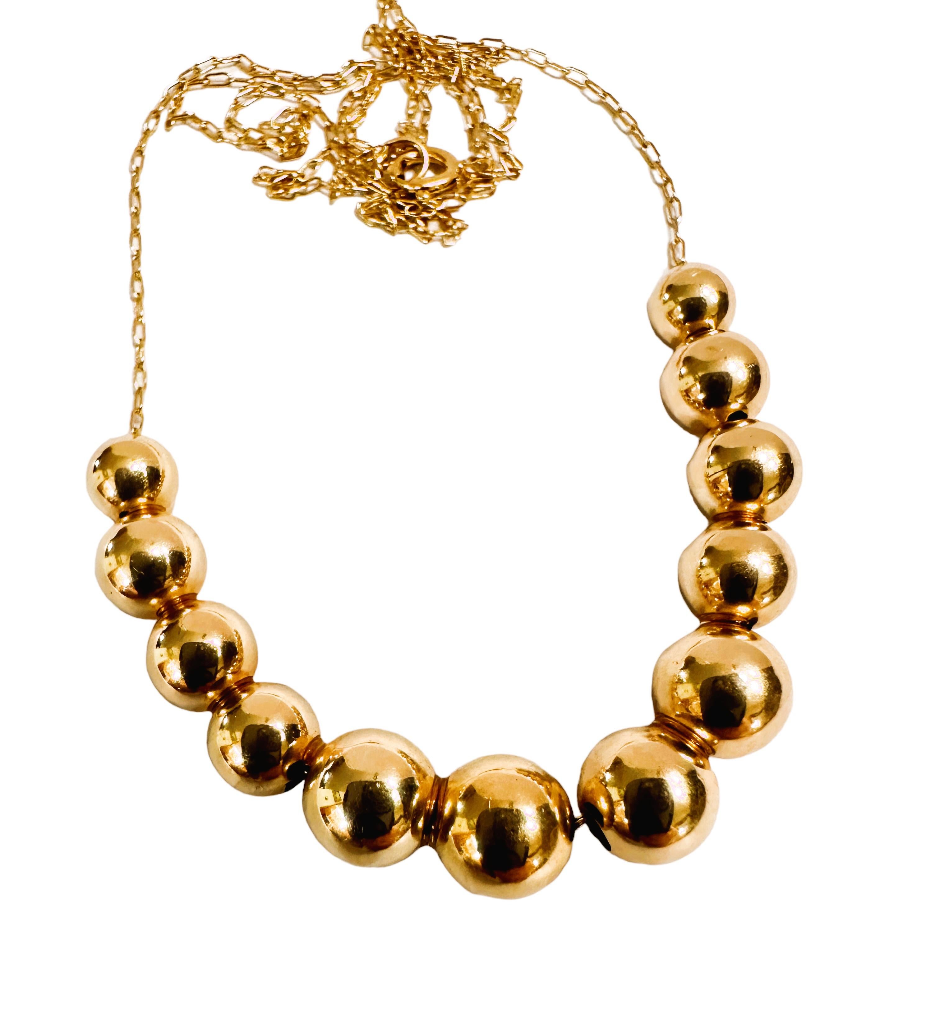 graduated gold bead necklace