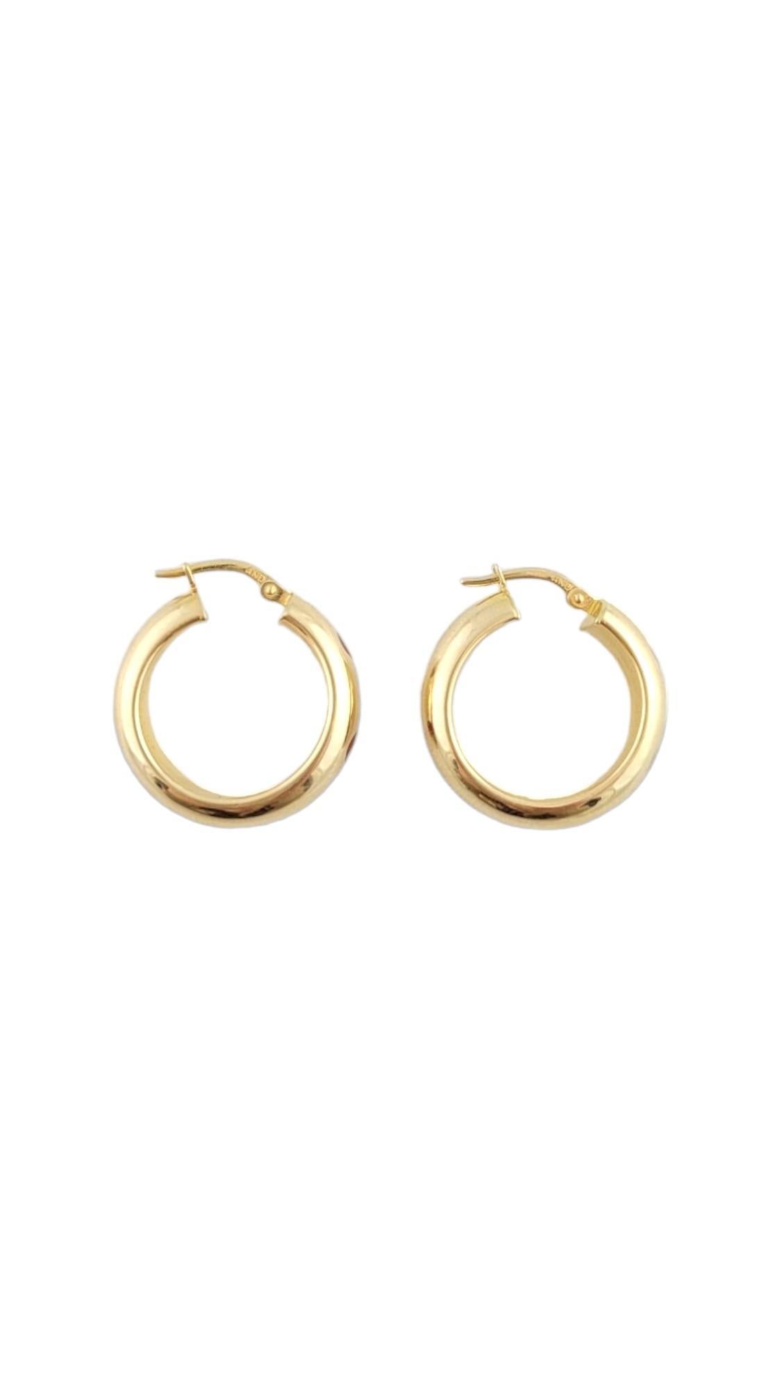 Vintage 14K Yellow Gold Hoop Earrings

Hoop earrings in 14 karat yellow gold.

Weight: 4.4 g/2.8 dwt.

Hallmark: 14 KT ITALY AND

Size: 23.7 mm X 6.1 mm X 3.1 mm

Approximately 6.1 mm thick.

Very good condition, professionally polished.

Will come